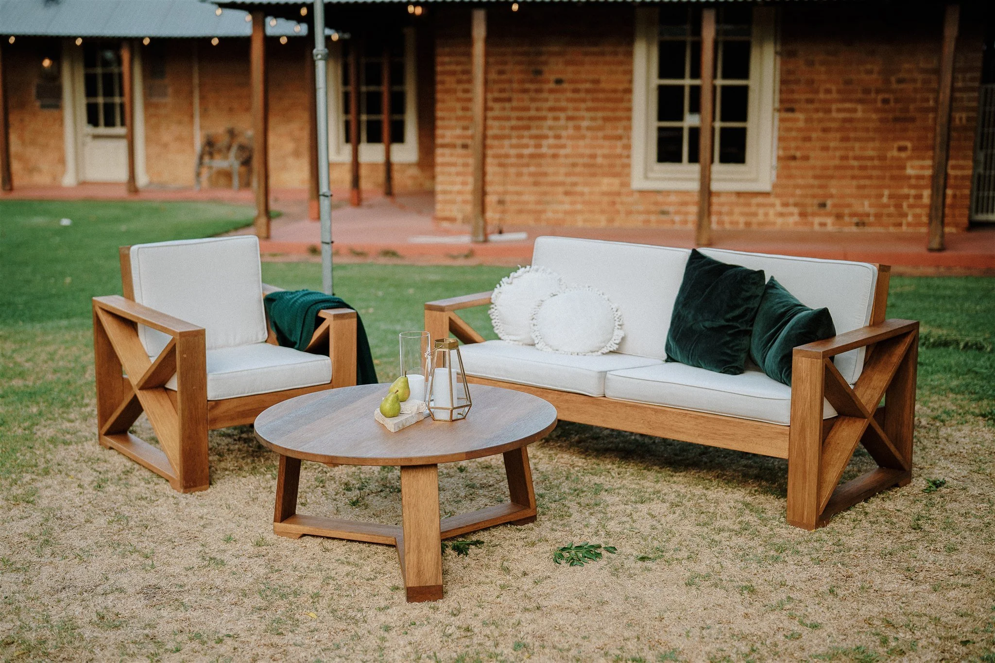 Outdoor wedding lounge with timber coffee table