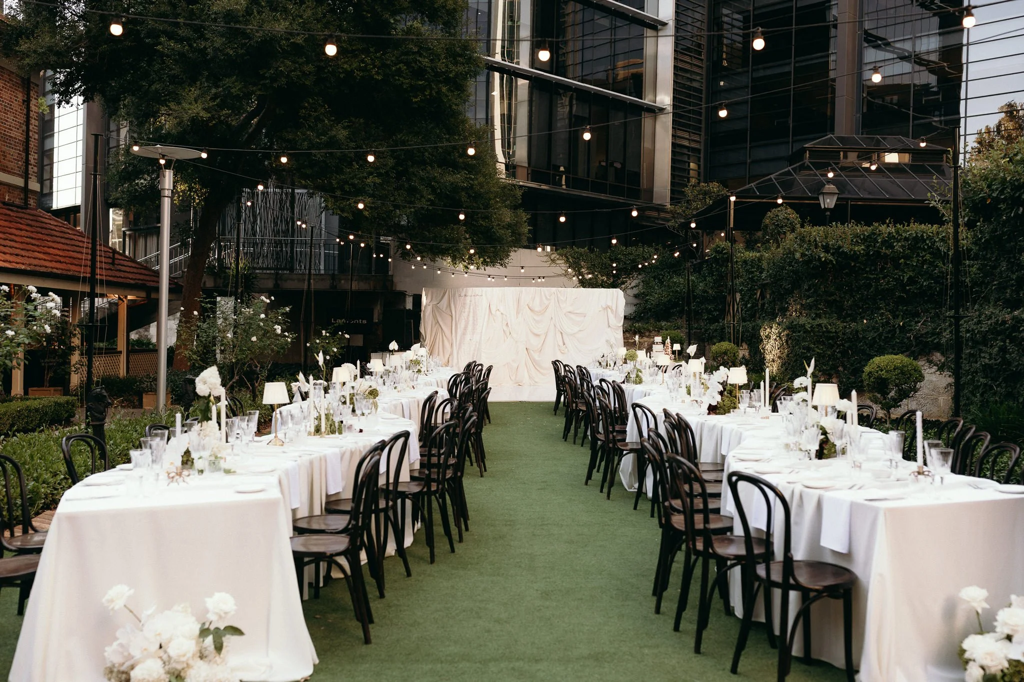 Double Serpentine Wedding Reception in the Rose Garden at Lamont's Bishop House