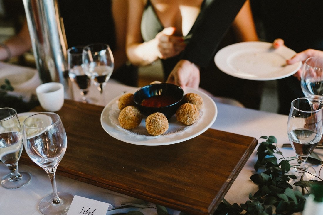 short table raiser for food platters on long dining tables