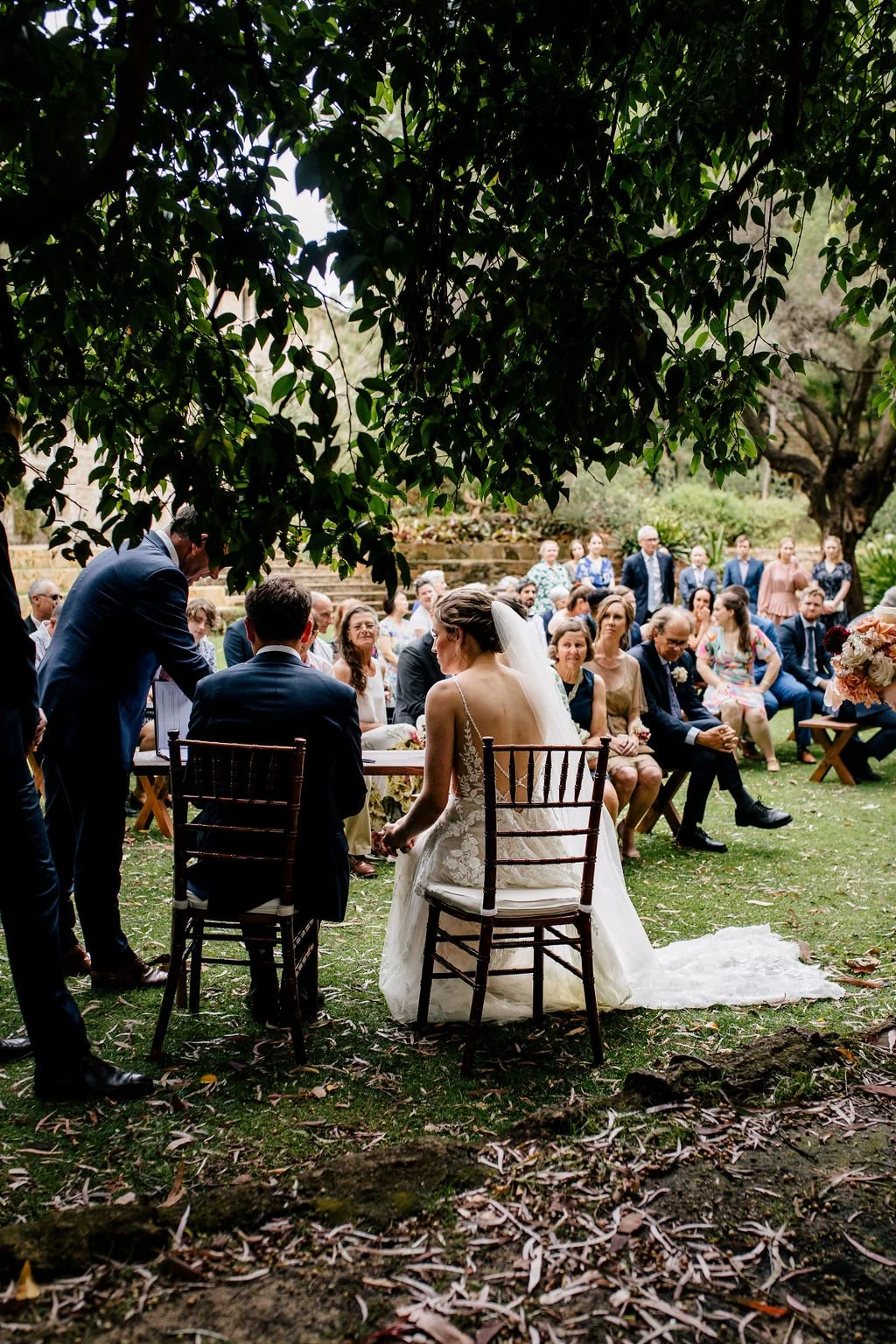 Little Dennis Walnut Table at a wedding ceremony