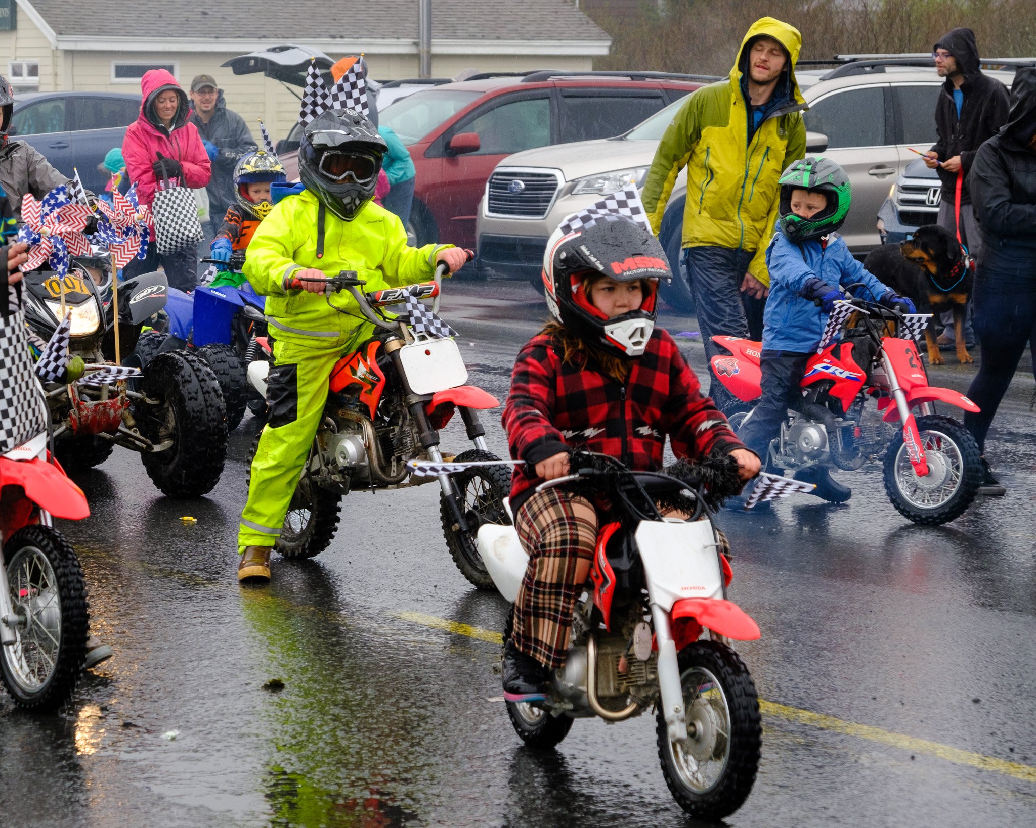 8. The Kodiak Island Racing Association had several kids riding the parade's route and revving their engines for the crowds, May 27, 2023.  (Brian Venua, KMXT).jpg