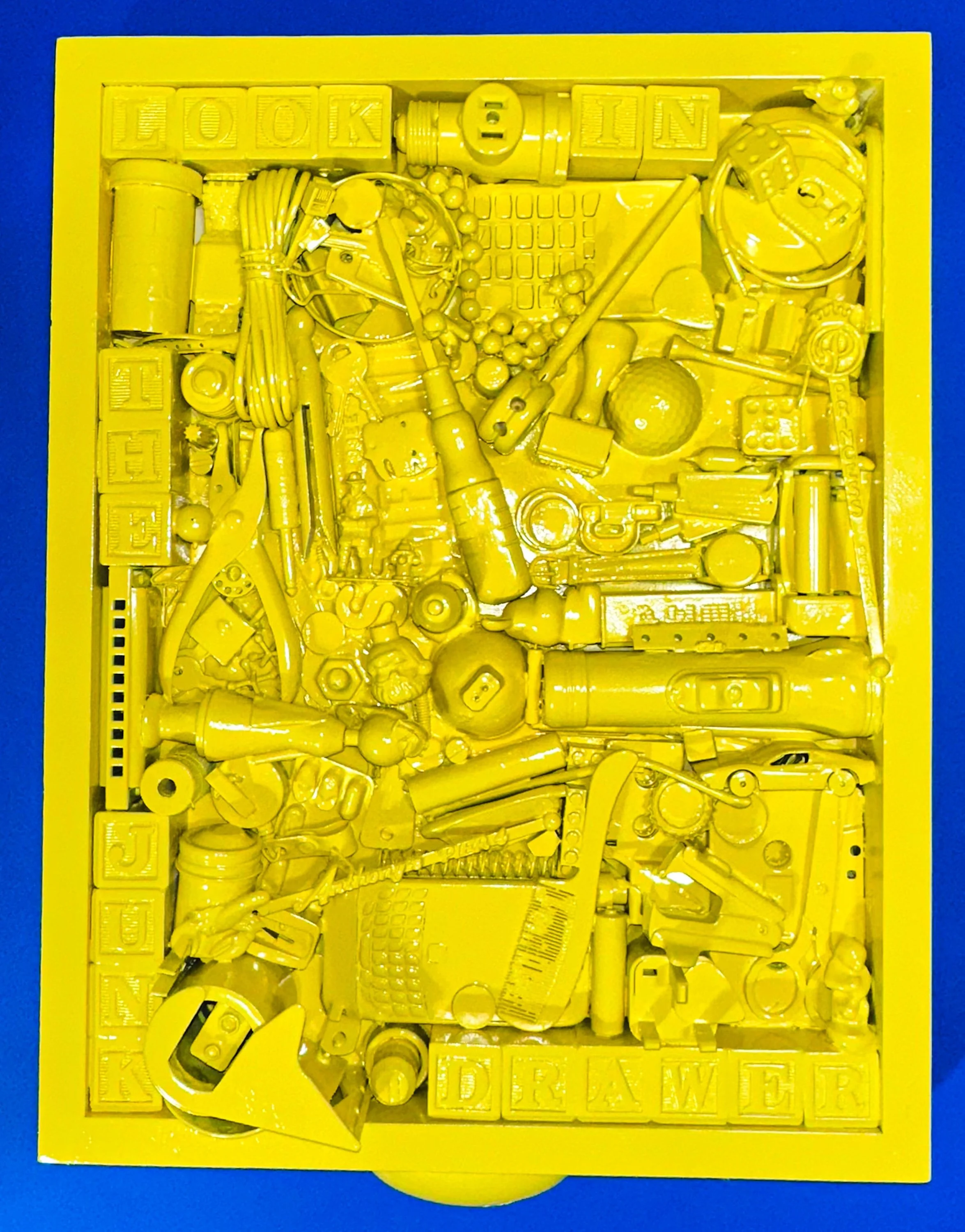 Monochrome in Yellow; Look in the Junk Drawer. Found Object Assemblage, 18 X 14 X 2.5, $525