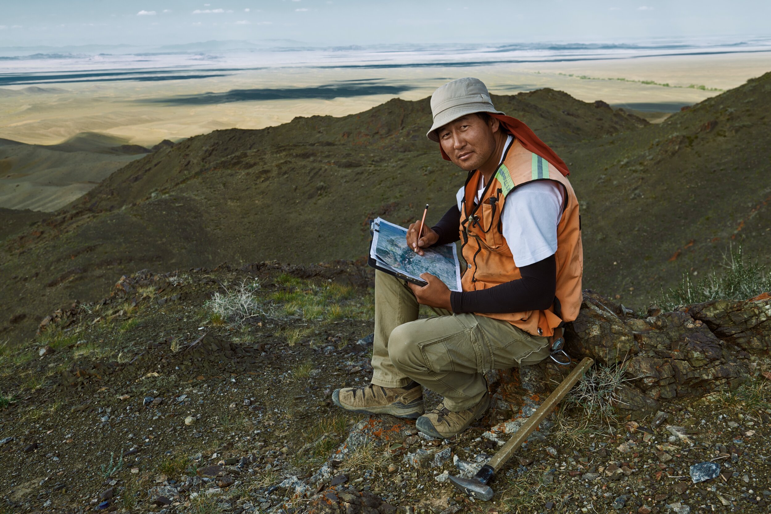 Otgonbaatar Dorjsuren, large scale mapping team, in the foothills of the Altai Mountains, with the plains of the Gobi desert in the background.