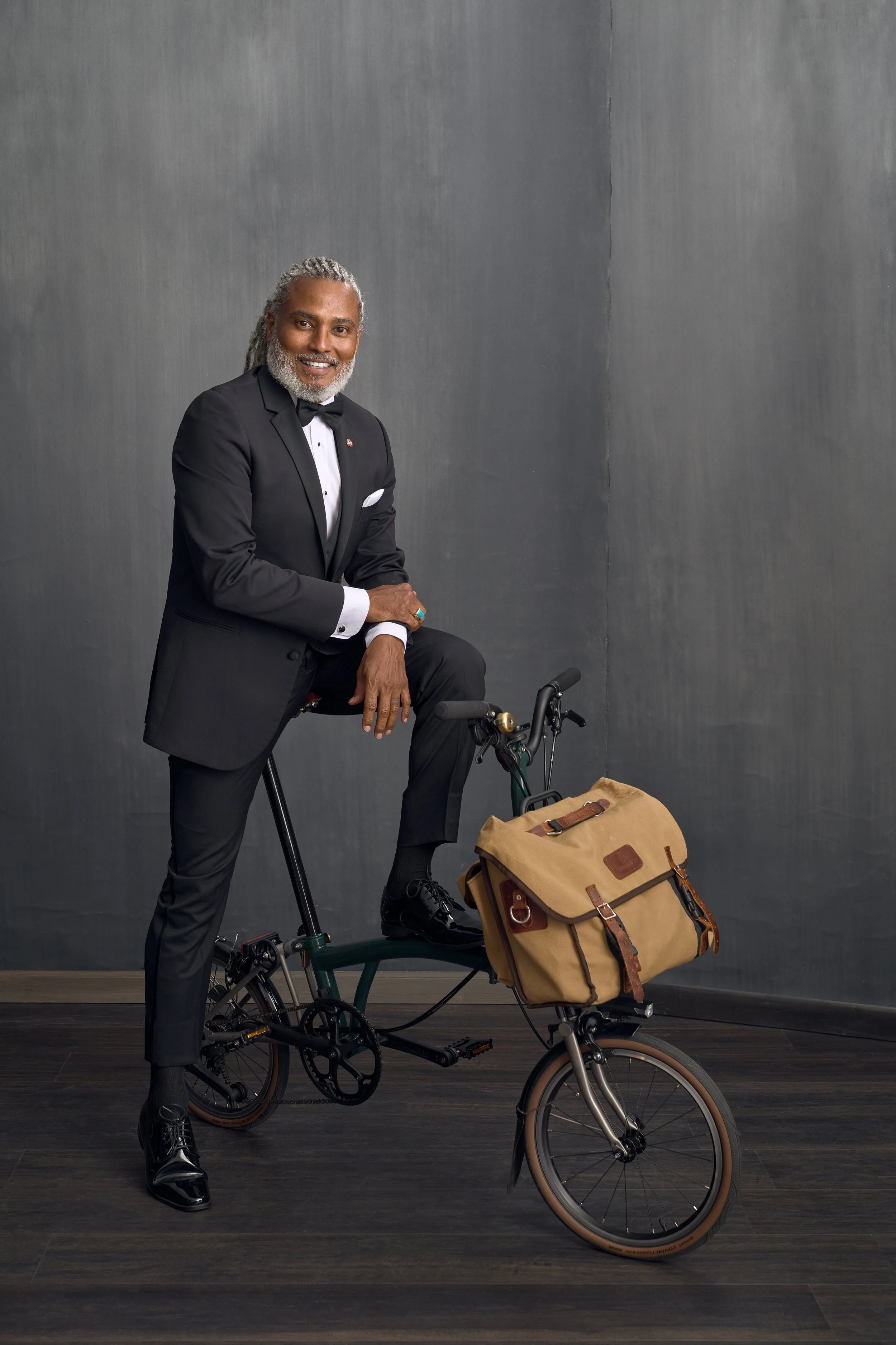 Historian/Explorer Erick Cedeño, the 'Bicycle Nomad' with limited edition BROMPTON x BREMONT x CHEANEY bike, outfitted with handcrafted Carradice bike bags. 
