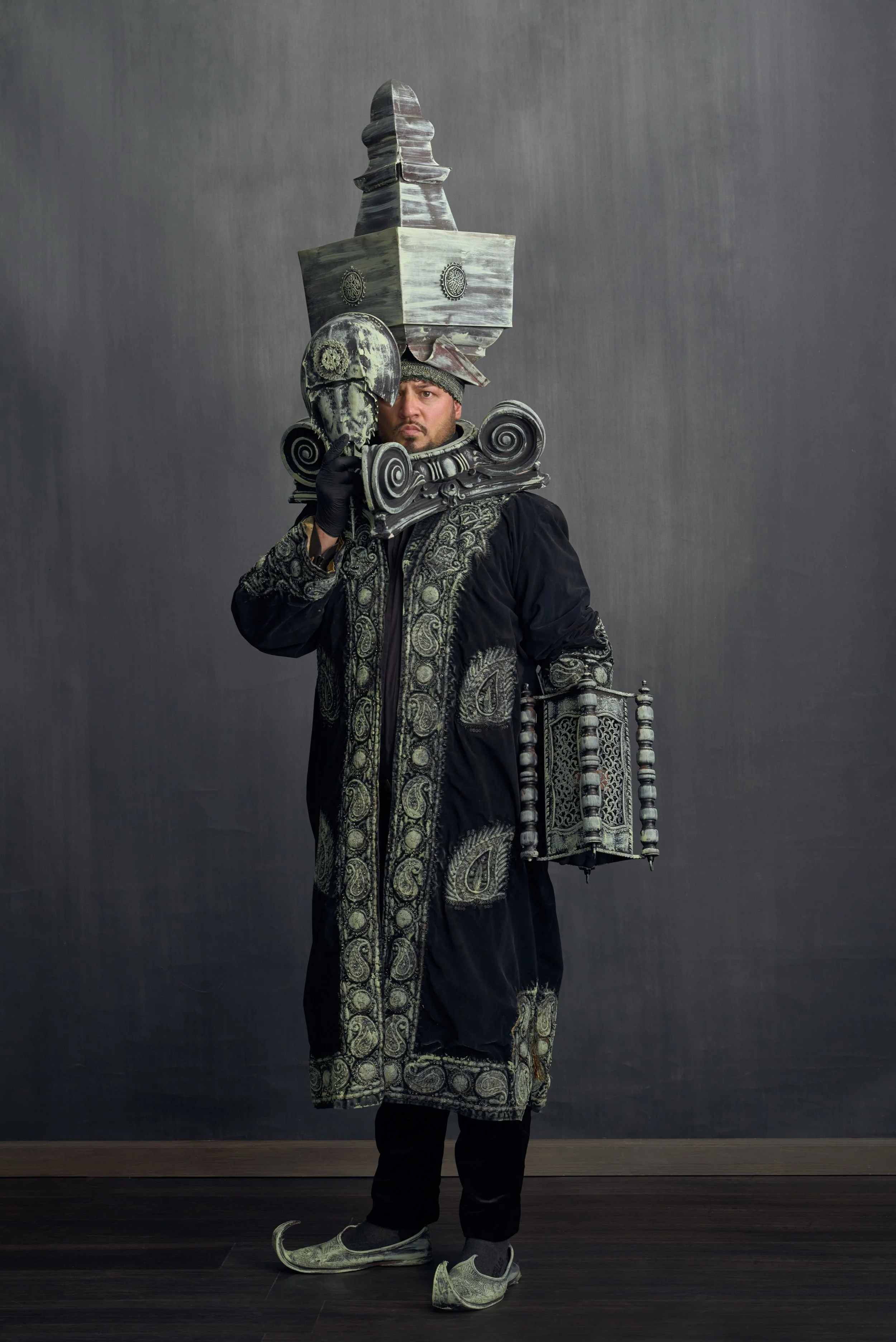 Justin Fornal as The Oracle of Ozymandias; a spirit of lost civilizations and ancient esoteric knowledge that we will never rediscover.

The cloak is a Kazakhstani chapan, the neck piece is the capital from an lonic column, the mask is a molted horse
