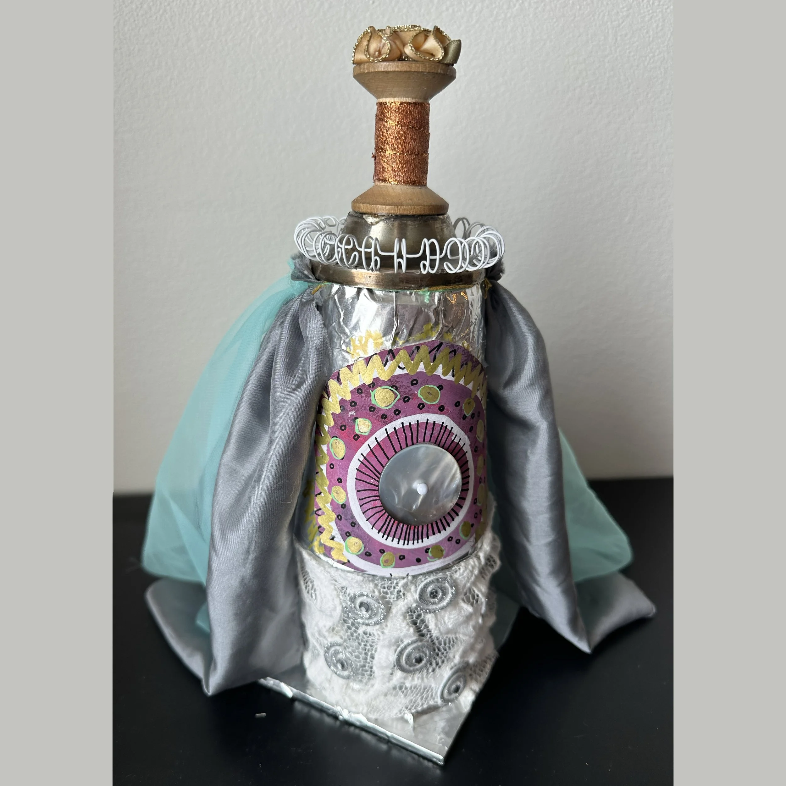 Queen of herself doll front side SQ.jpg