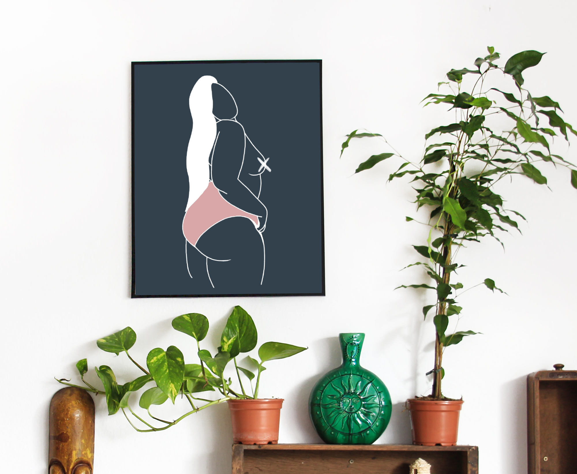Interior with potted plants on a wooden shelf and a vibrant green decorative plate, wall art featuring a stylized white line drawing of a woman on a dark background, and various decorative objects including a large gourd-shaped item and a small green