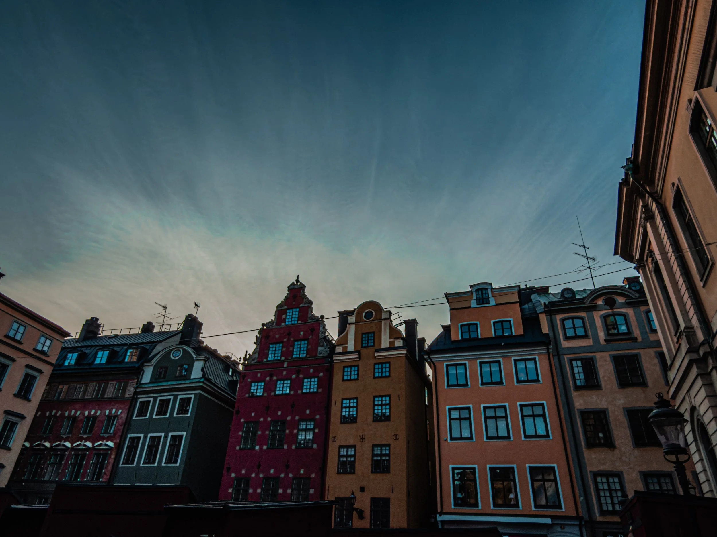 Colorful old buildings with a clear sky above.