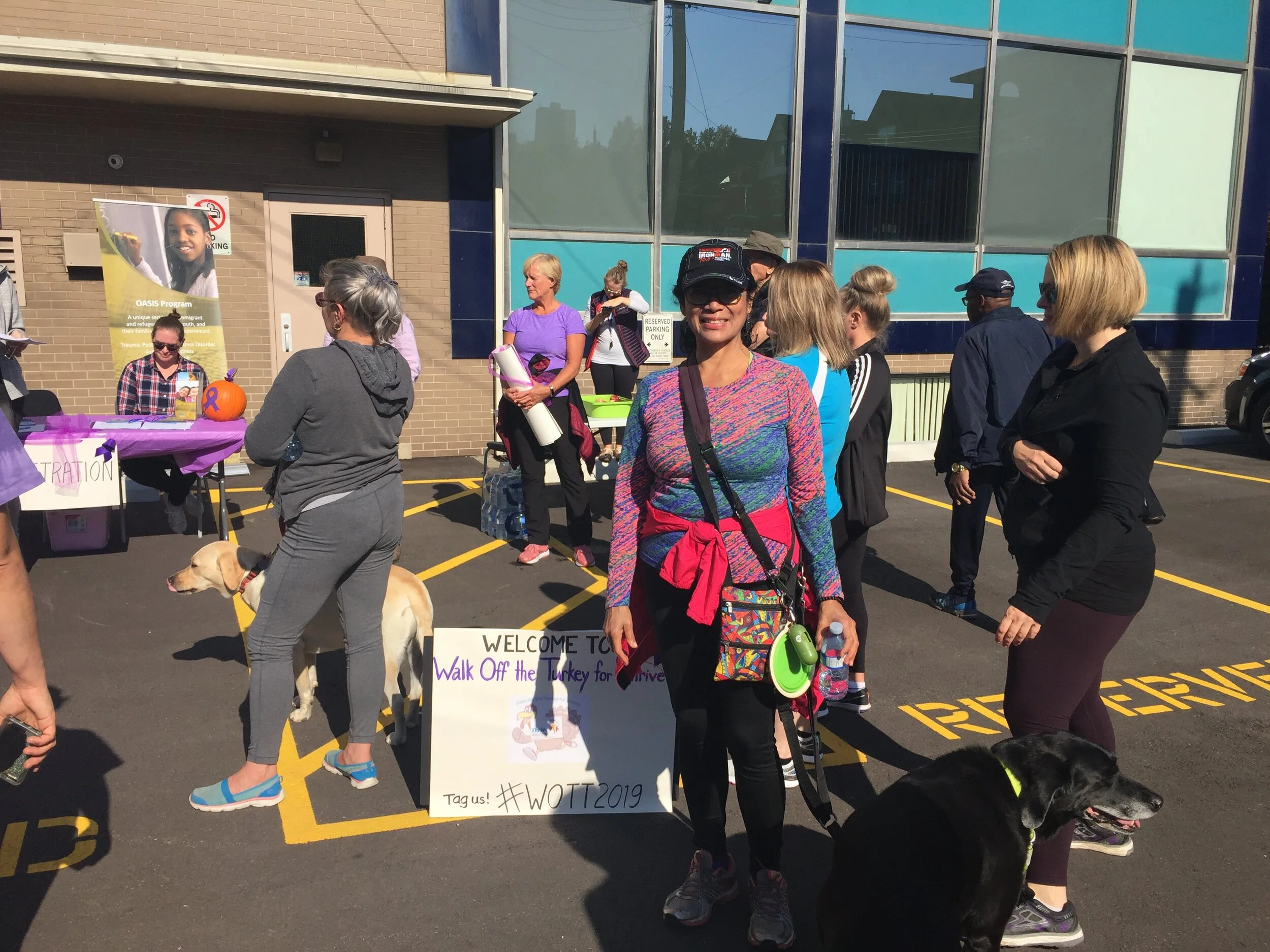 Beverly Bronte Tinkew, CLC member (facing camera) gets ready to ‘walk off the turkey’ with Lilah, her faithful canine companion!