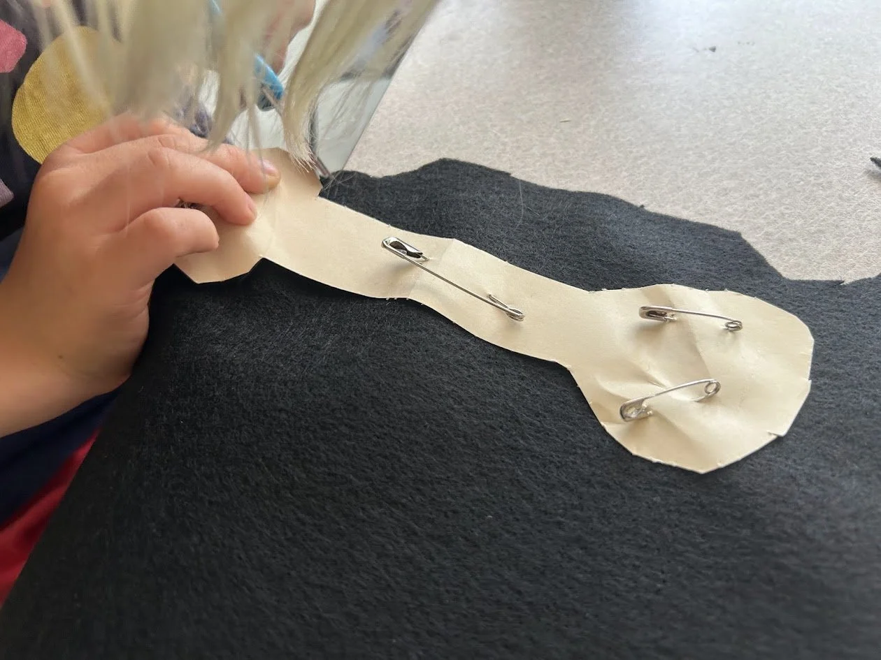 Funky, Furry, Feisty, Friends Camp MM cutting out felt snake.jpg