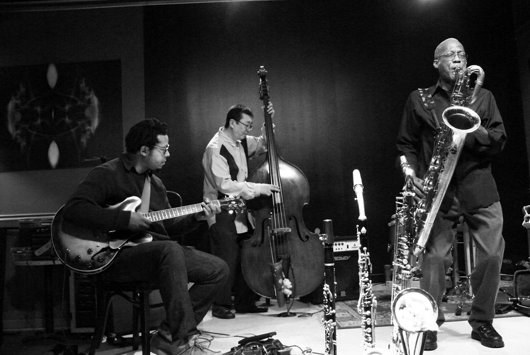   Velvet photo two: Seen here working it our are guitarist Jeff Parker, bassist Tatsu Aoki, and baritone saxophonist Mwata Bowden. (Photo by Lauren Deutsch)&nbsp;   