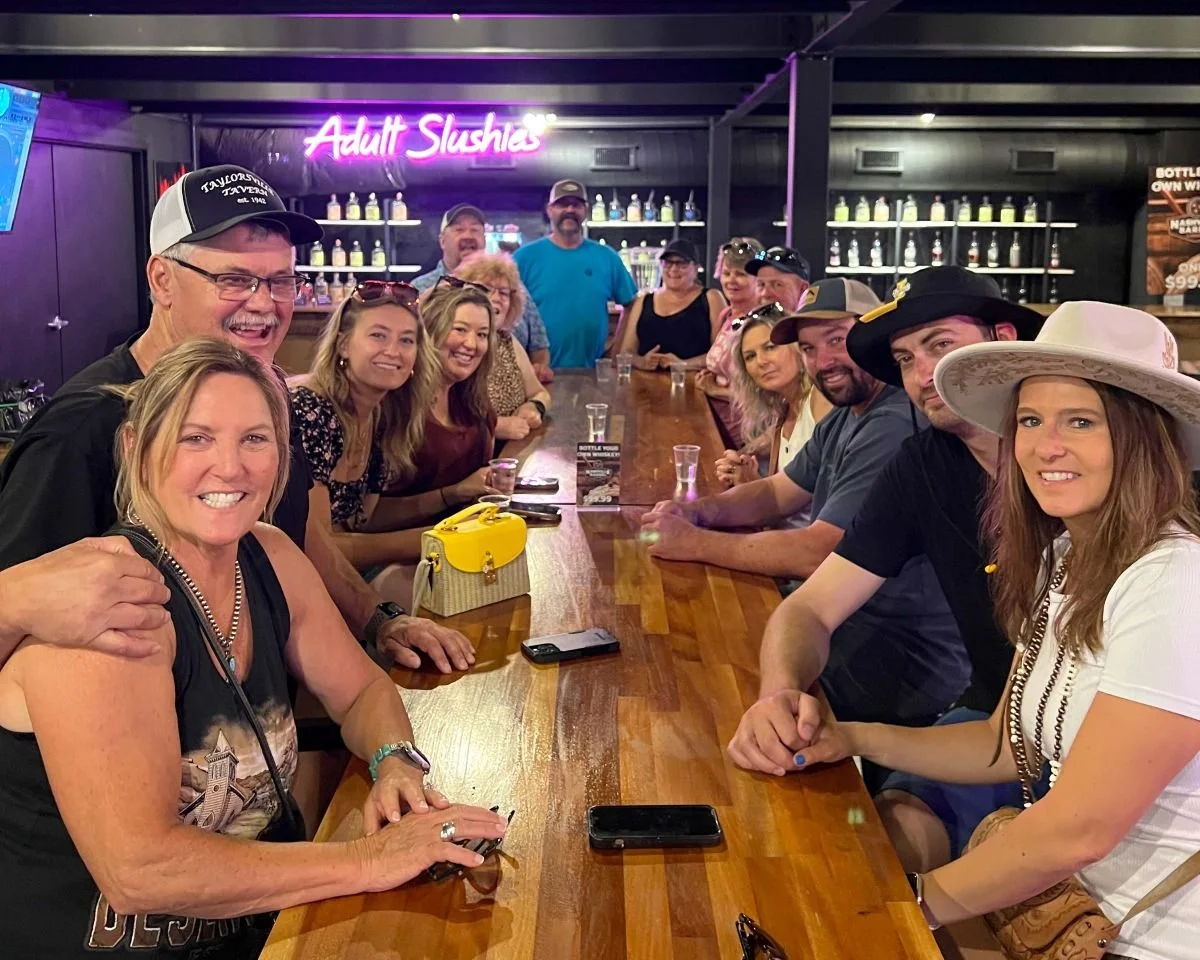 Guests sampling Tennessee whiskey and spirits during a guided distillery tasting