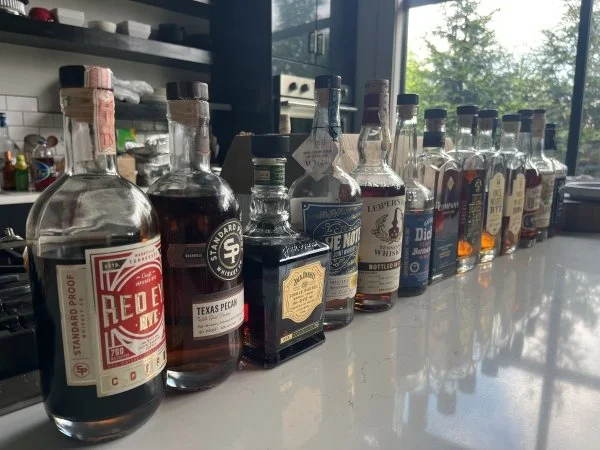 Group enjoying a guided Tennessee whiskey tasting at their Nashville location