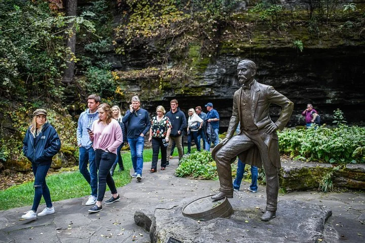 Guests visiting the Jack Daniel’s Distillery in Lynchburg on a whiskey tour from Nashville