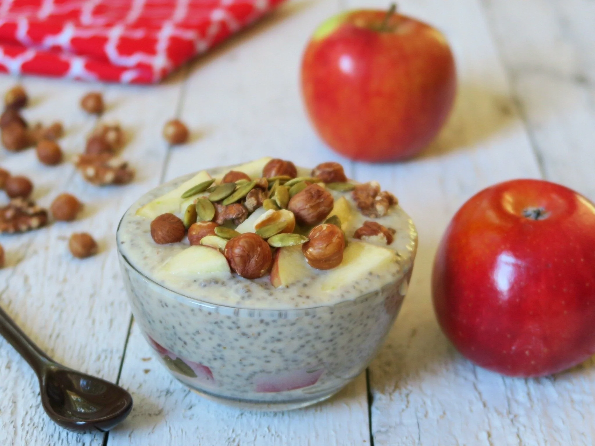 Happy smiling woman with curly hair lounging on couch.