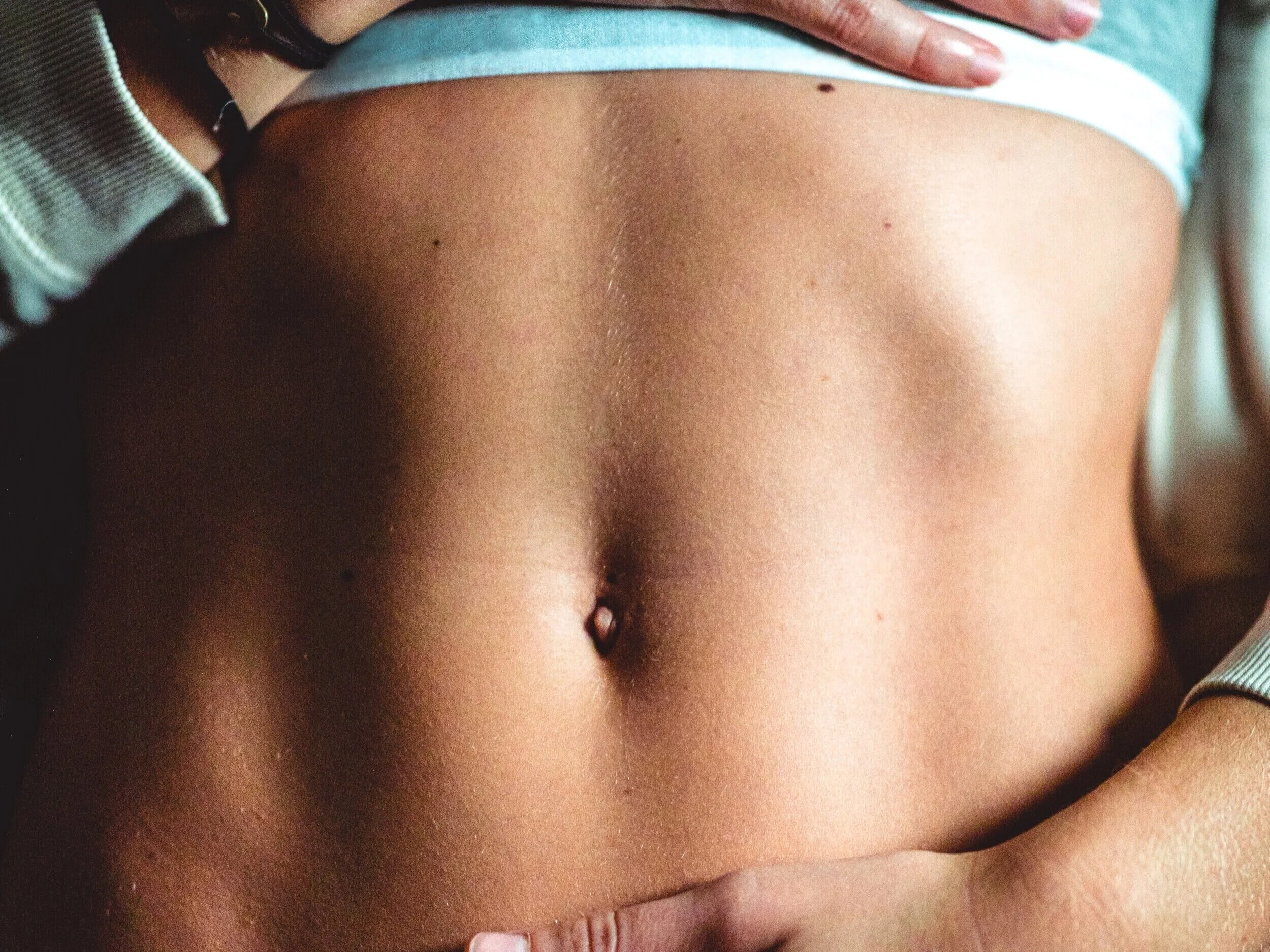 Scenic shot of the beach with waves hitting the rocks.