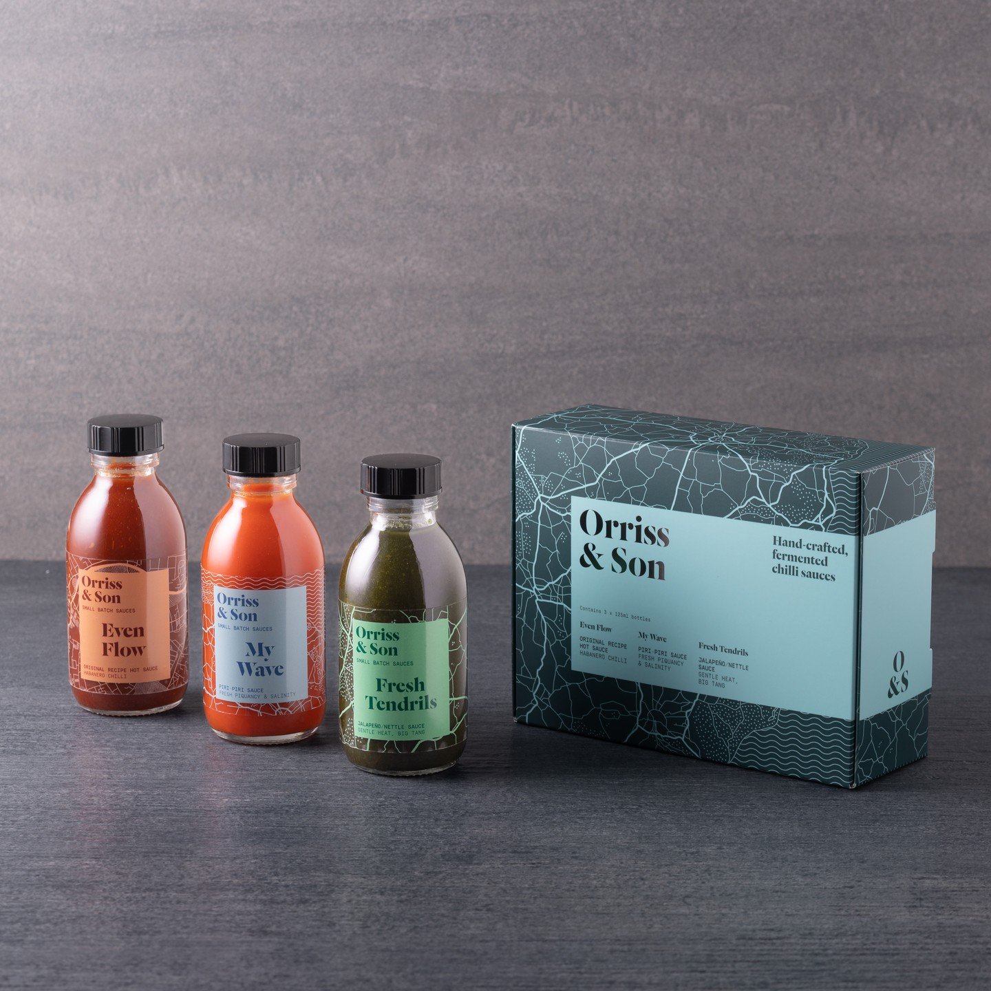 🎄🔥 Spice Up Christmas with a Kick! 🌶 🔥🎄

Looking for the perfect gift for the foodie or heat lover in your life? This Grunge &amp; Map inspired Hot Sauce Gift Box has it going on&mdash; the beautifully realised packaging paired with the thrill o