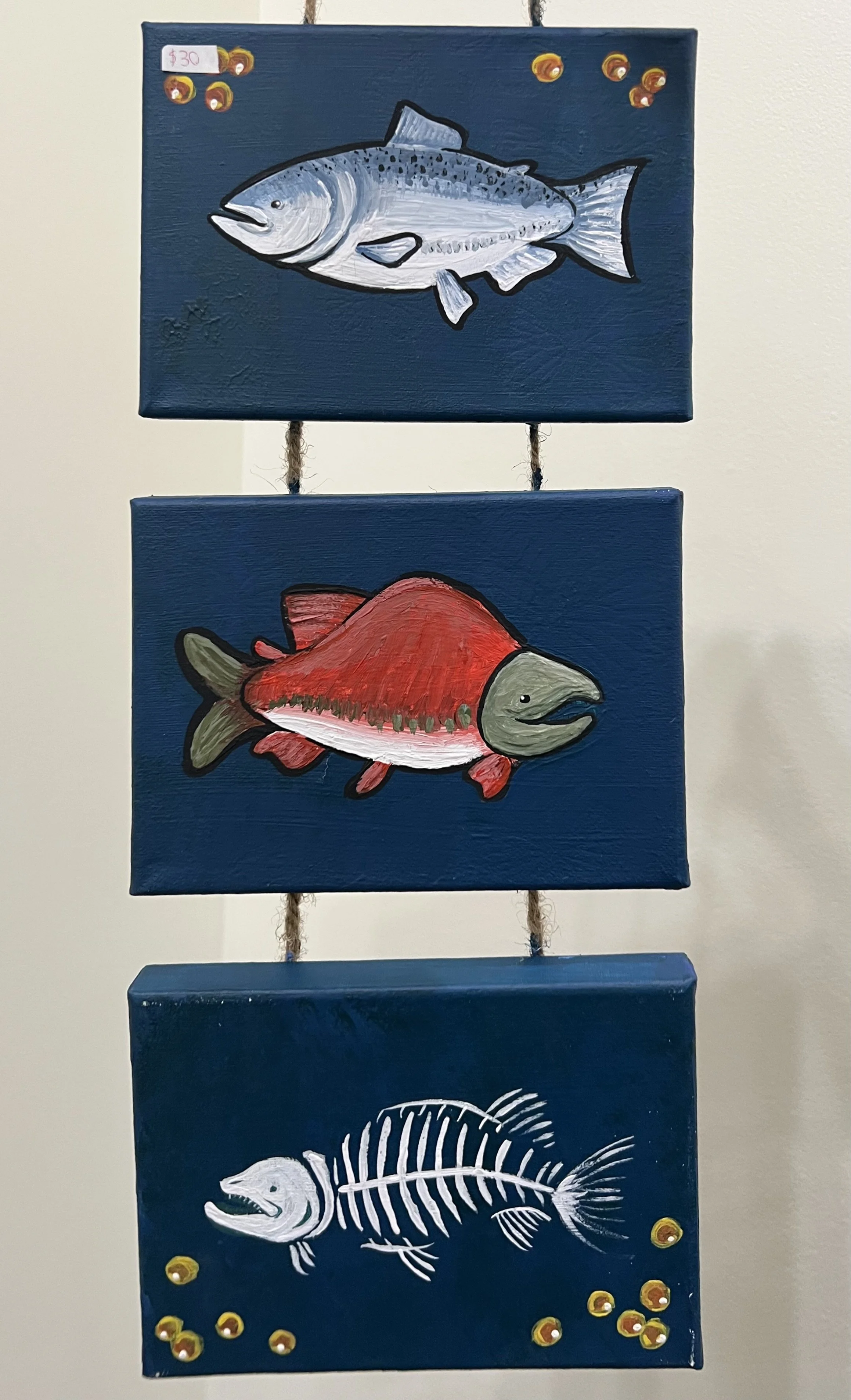 Salmon’s Lifespan. Medium: Acrylic on canvas, twine. Set of three 6’’x9’’