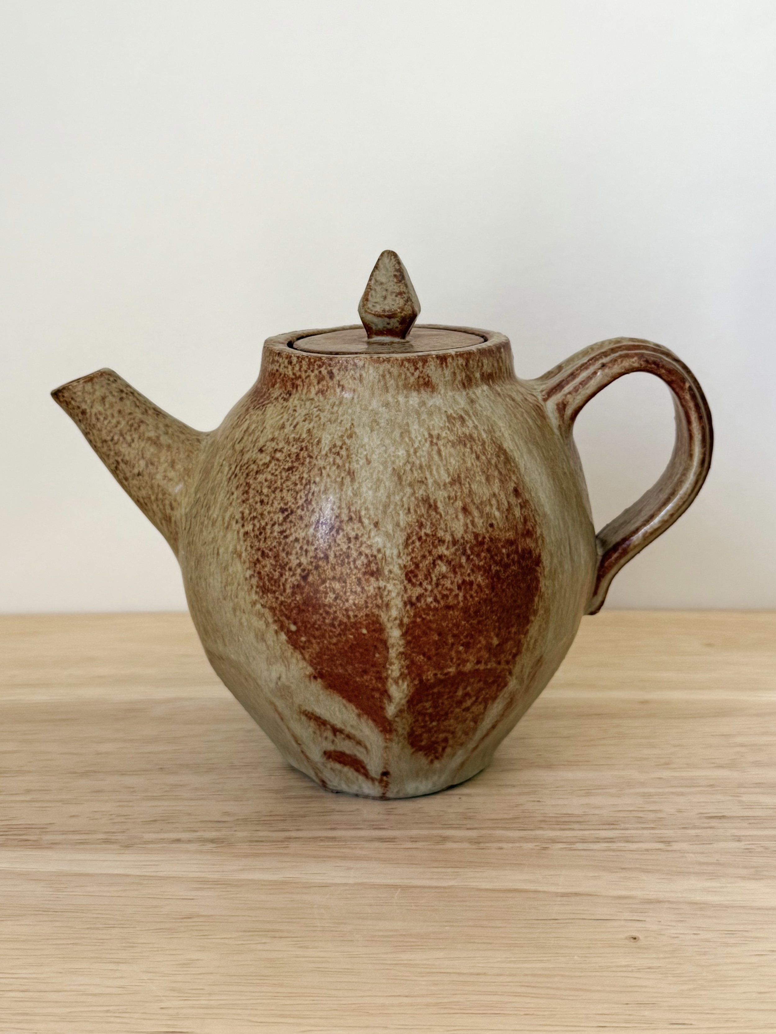 Faceted Teapot (2024), high fire reduction stoneware, 7 x 6 x 6 inches