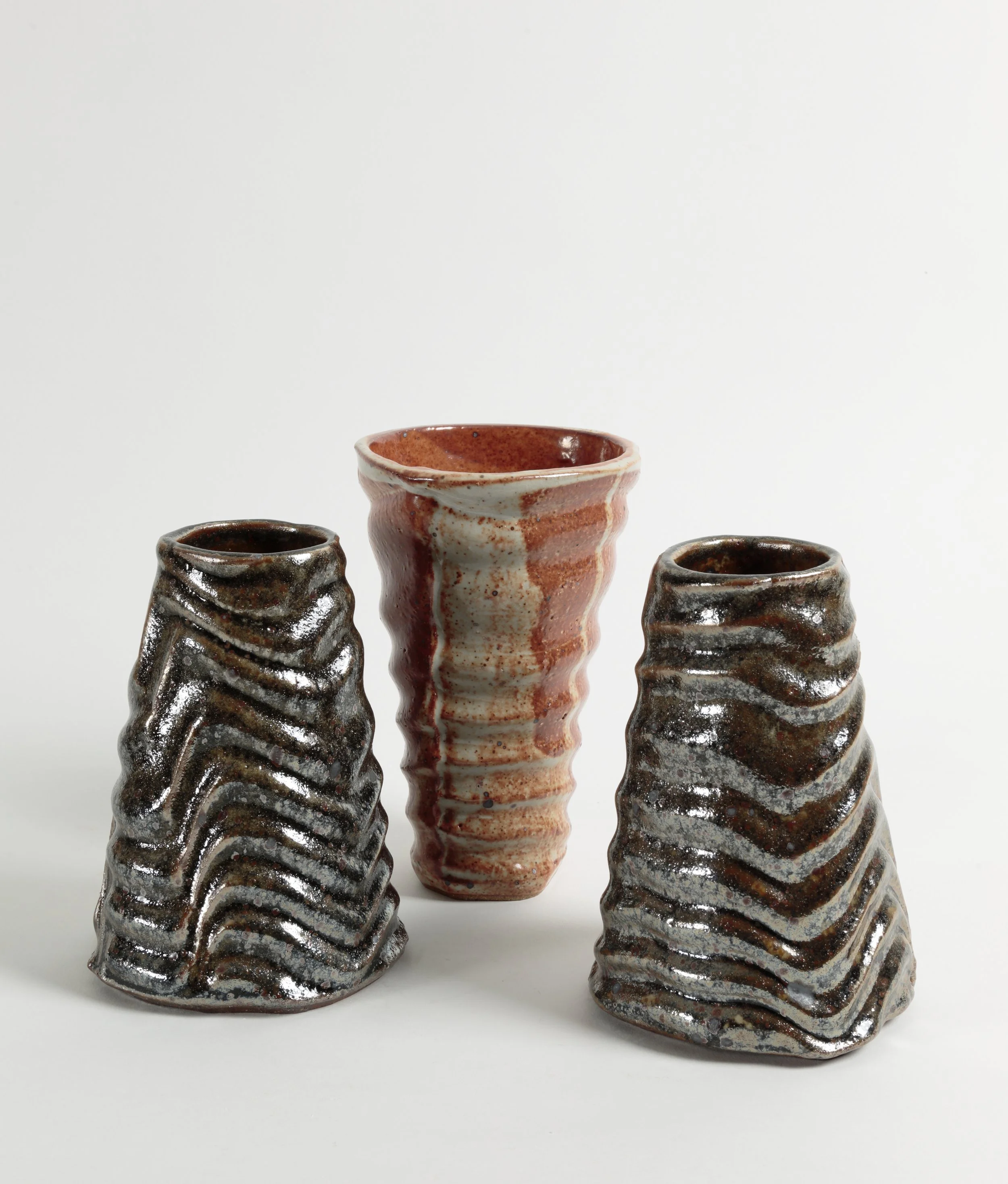 Jan Alexander, vessels, Shino glazes, high fired.