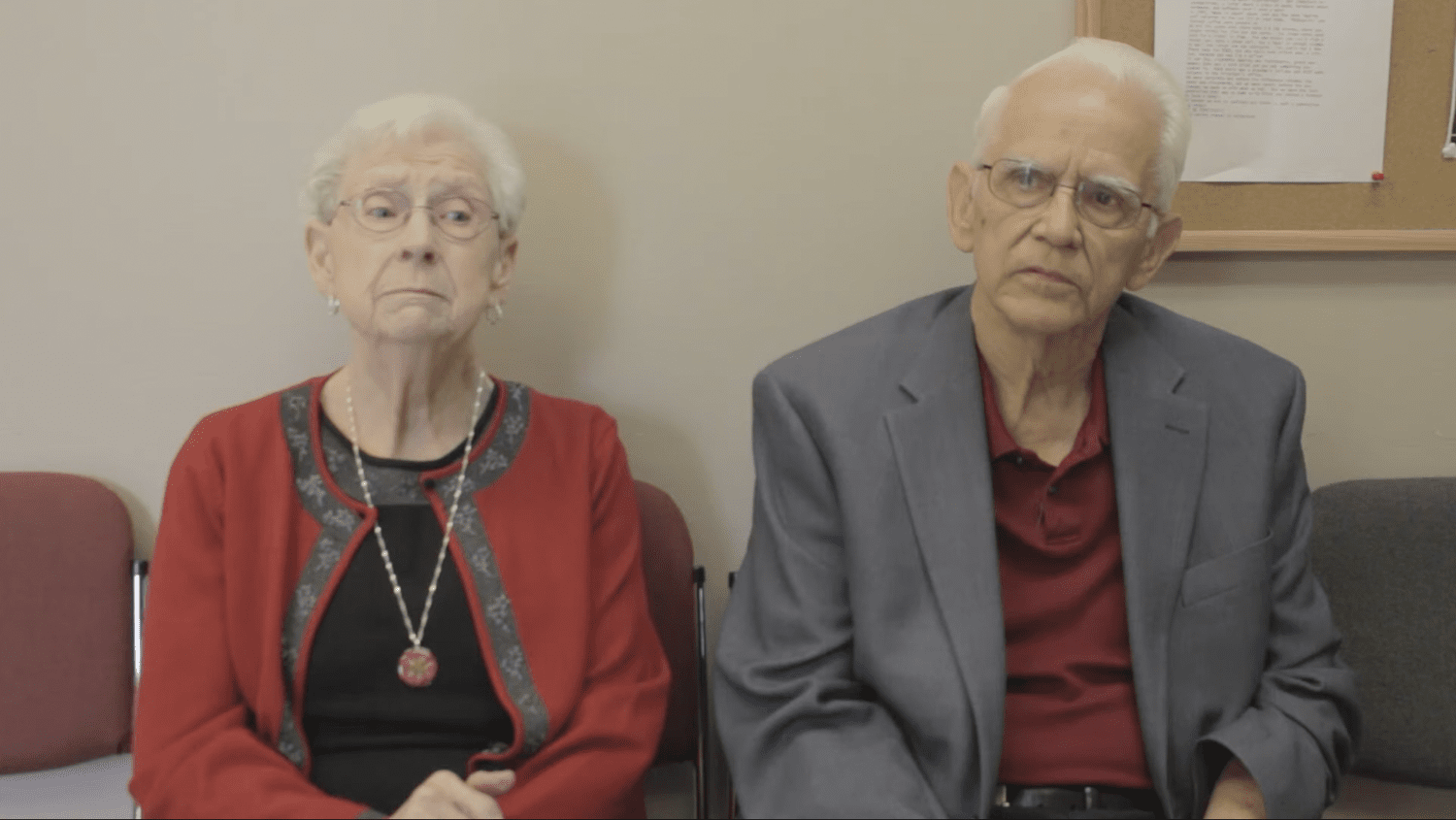 Elderly couple seated for a documentary-style church interview, filmed with soft lighting and clean audio to capture emotional storytelling and personal history.
