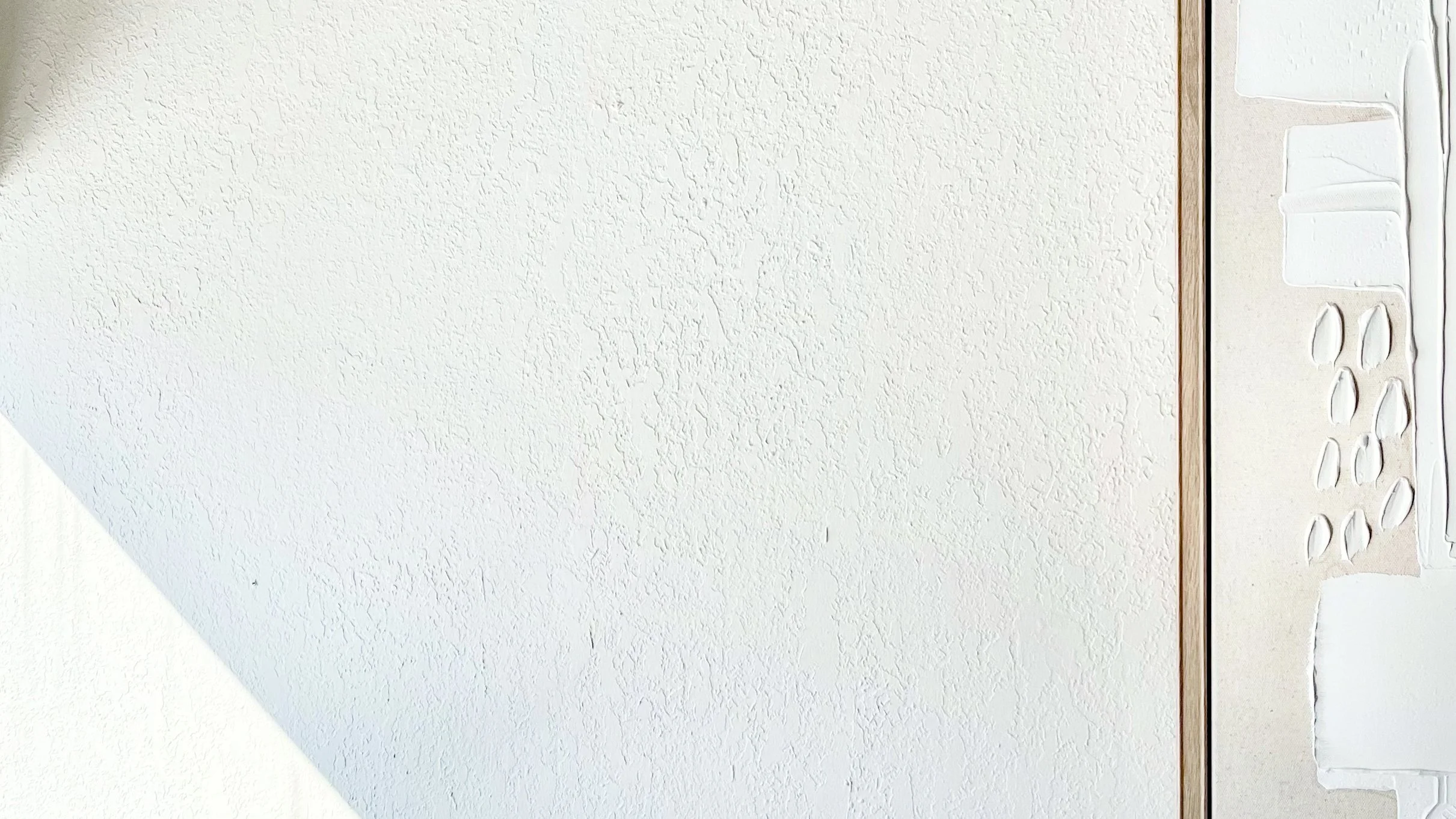 Abstract image of texture and painting in Andrew Wilton LCSW, integrative CBT therapist's office near Buffalo, New York.