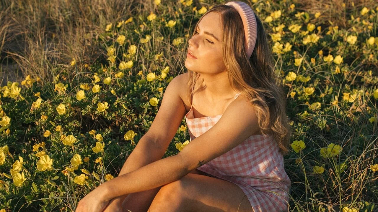 Brisbane indie pop songwriter EVIE returns with new single 'SWINGING ON THE BALCONY'