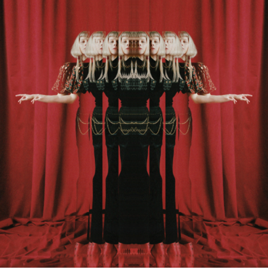 AURORA REVEALS BRAND NEW SINGLE "GIVING IN TO THE LOVE"