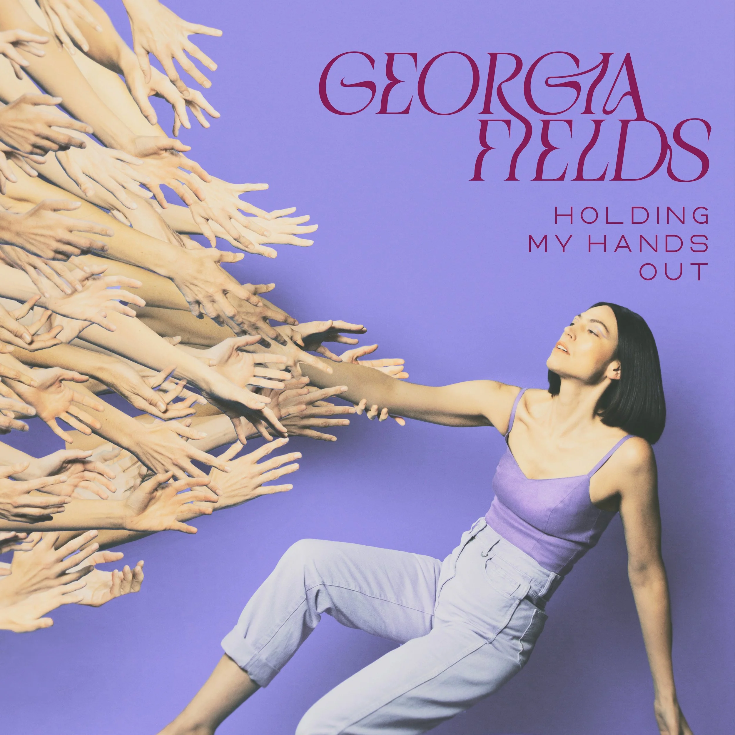 GEORGIA FIELDS DELIGHTS WITH EDGY INDIE POP SINGLE 'HOLDING MY HANDS OUT'