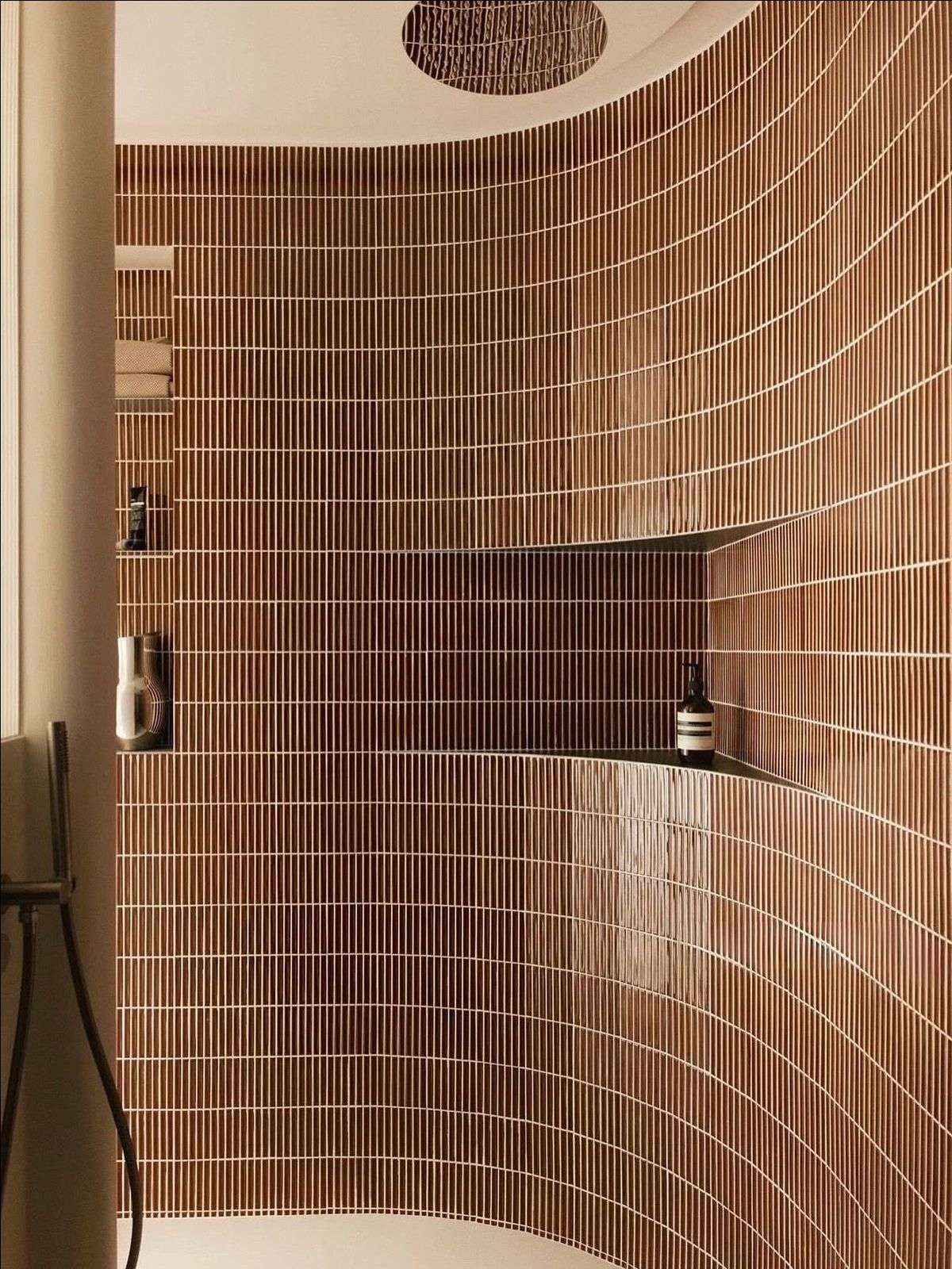 Vancouver interior designer reviewing bathroom tile samples with client in Kitsilano home