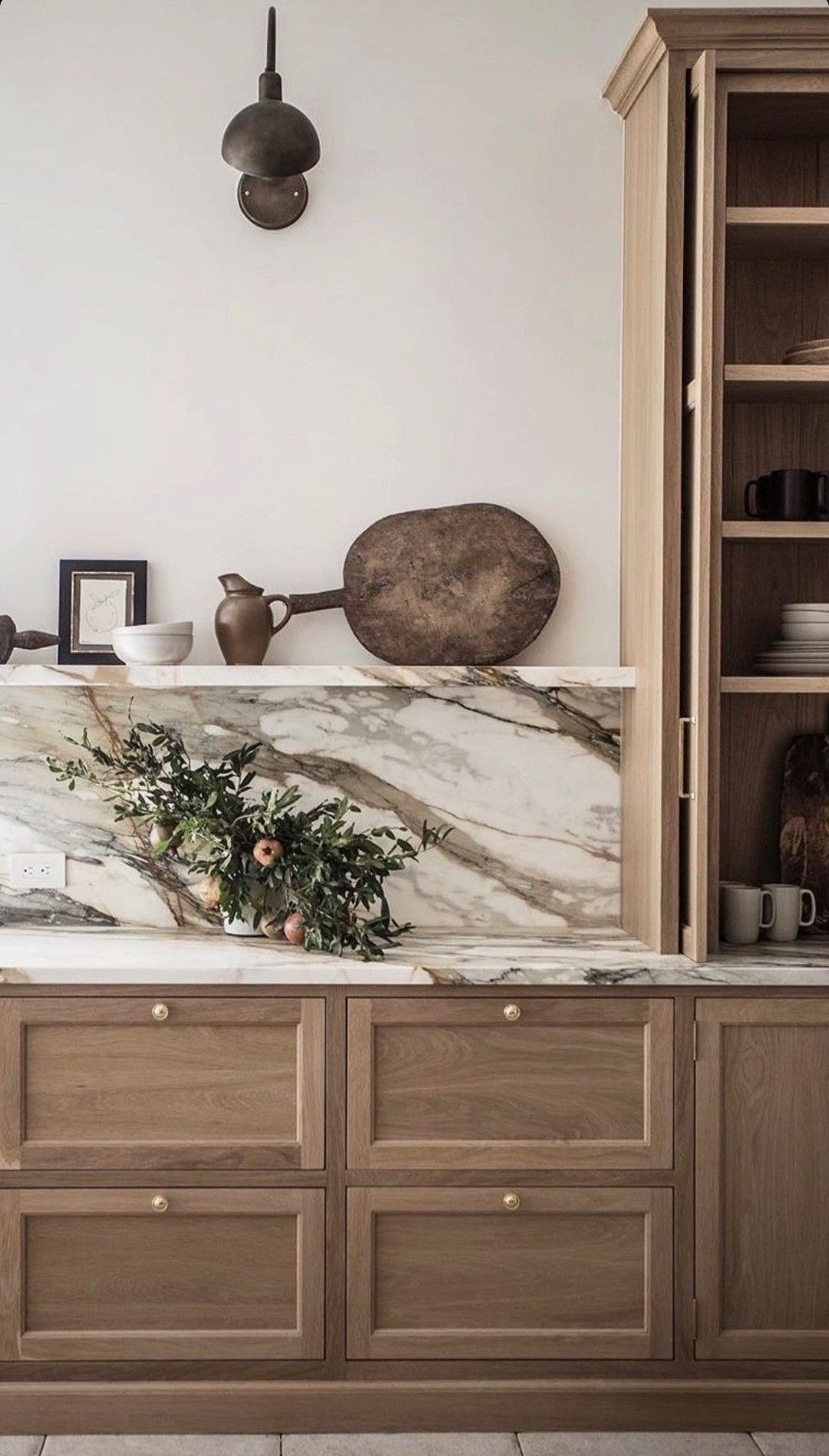 Modern Vancouver condo kitchen renovation with wood cabinets and porcelain countertops.