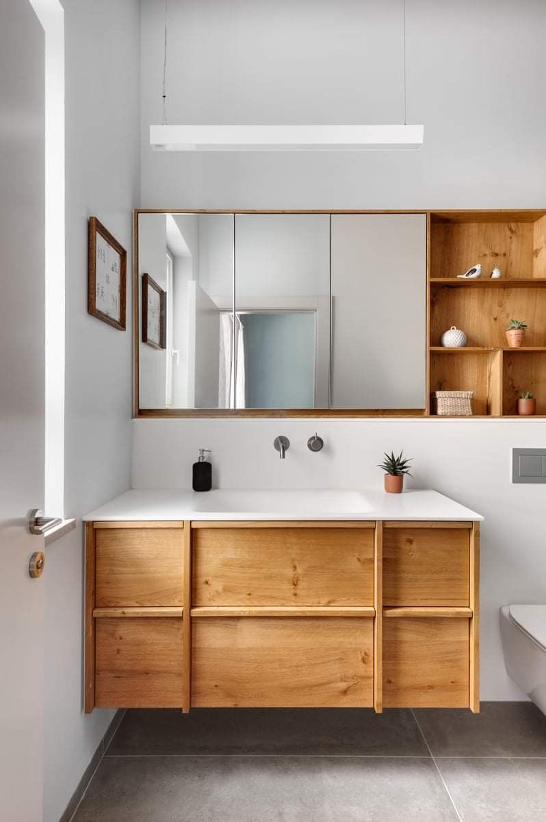 Small Vancouver condo bathroom remodel with tiled shower, floating vanity and upgraded lighting