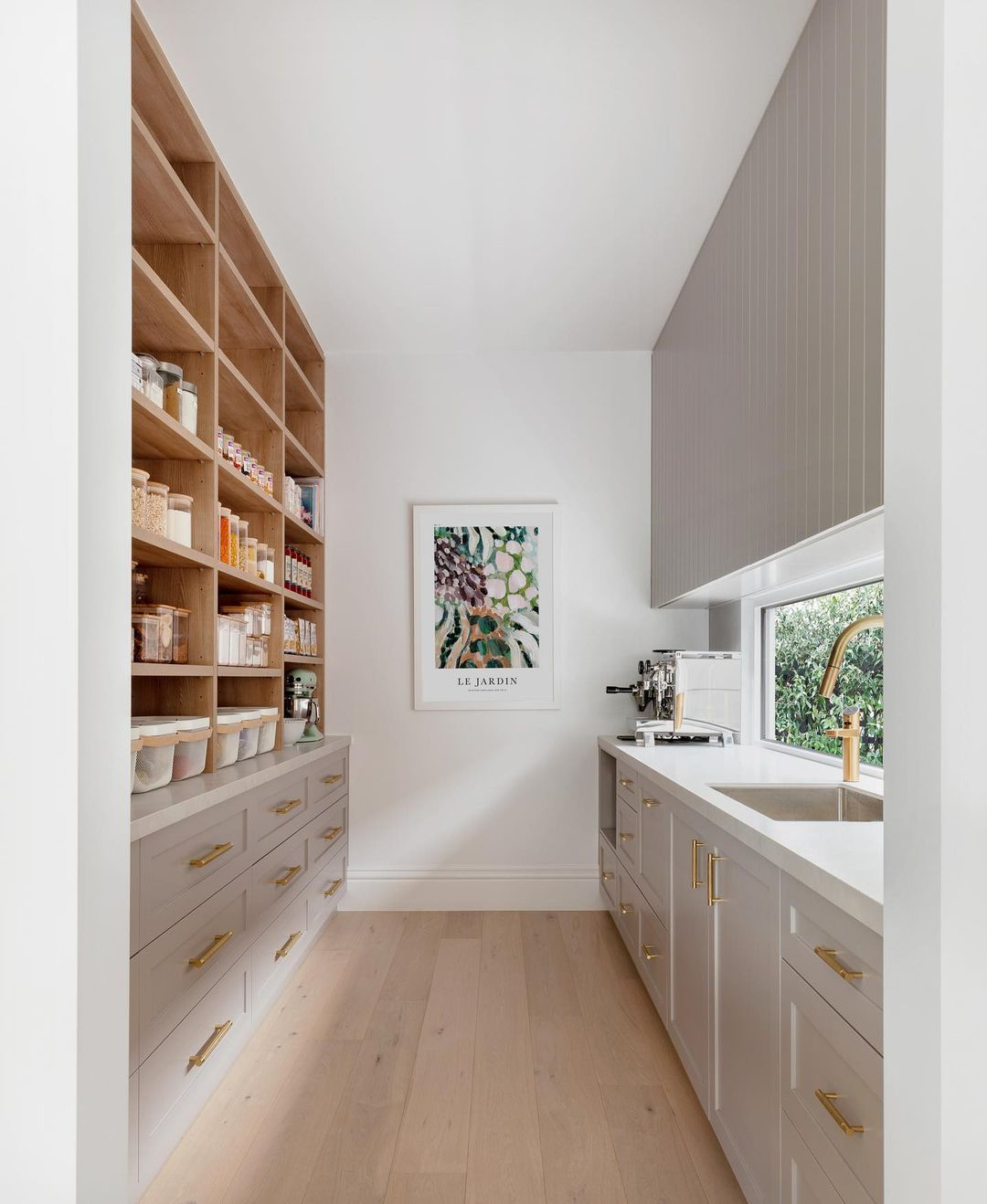 Butler's pantry with prep sink and custom storage cabinetry in a Kitsilano character home kitchen