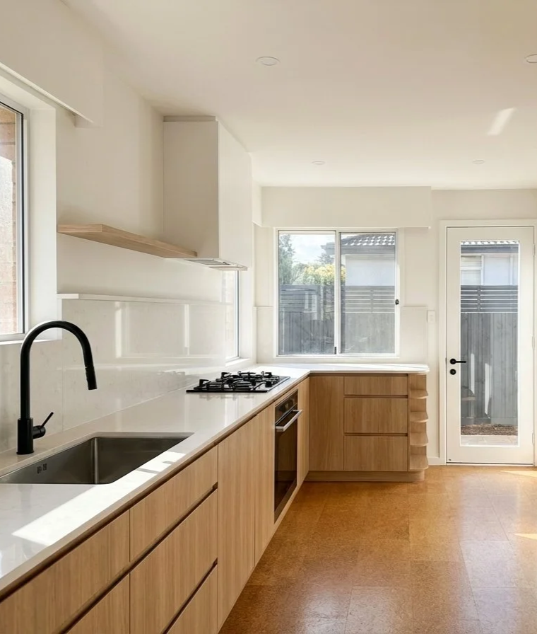East Van Vancouver Special main floor renovated by HART HOUS with an opened-up kitchen