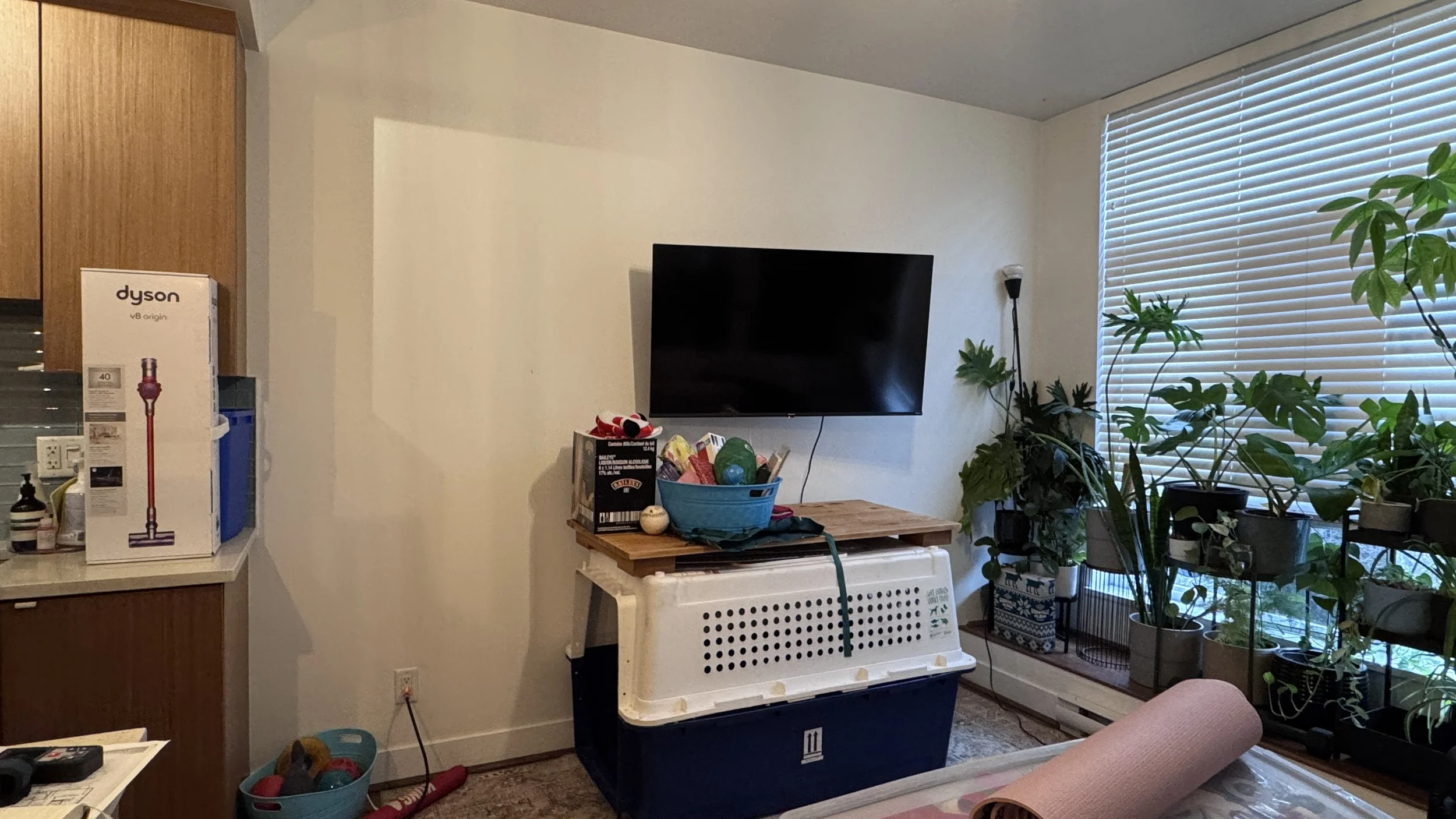 North Vancouver custom millwork by HART HOUS - built-in feature wall millwork designed to make a previously unfinished wall feel finished, functional, and beautiful in a small space.