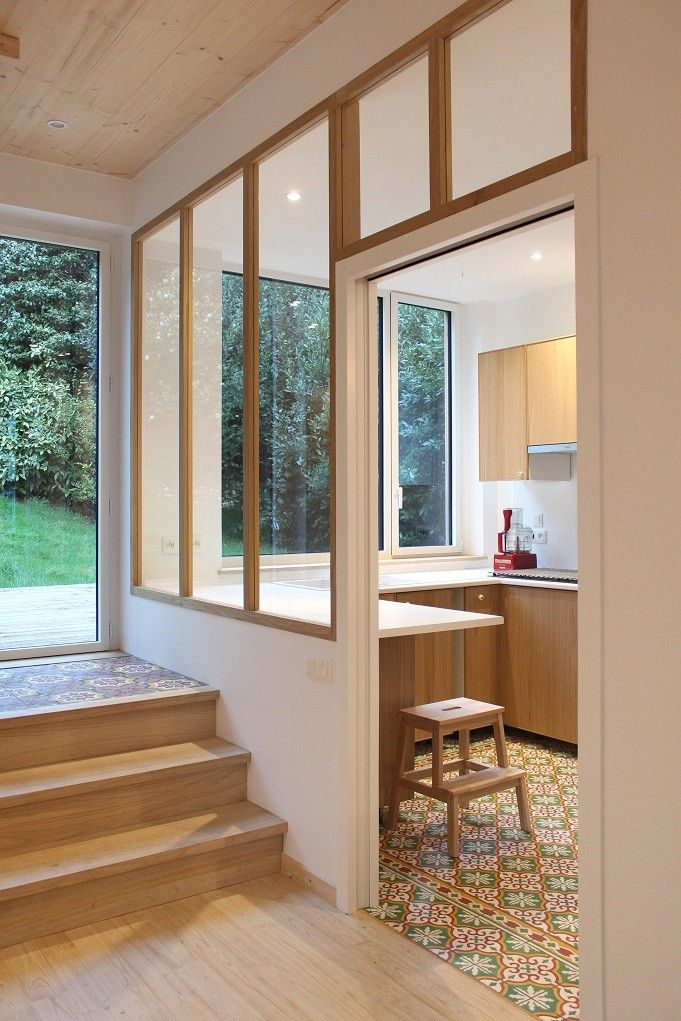 Modern Vancouver condo kitchen and living room with semi open layout and built in storage