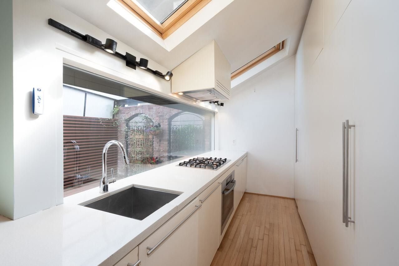 Kitchen design and custom dining room banquette by HART HOUS in Vancouver BC.