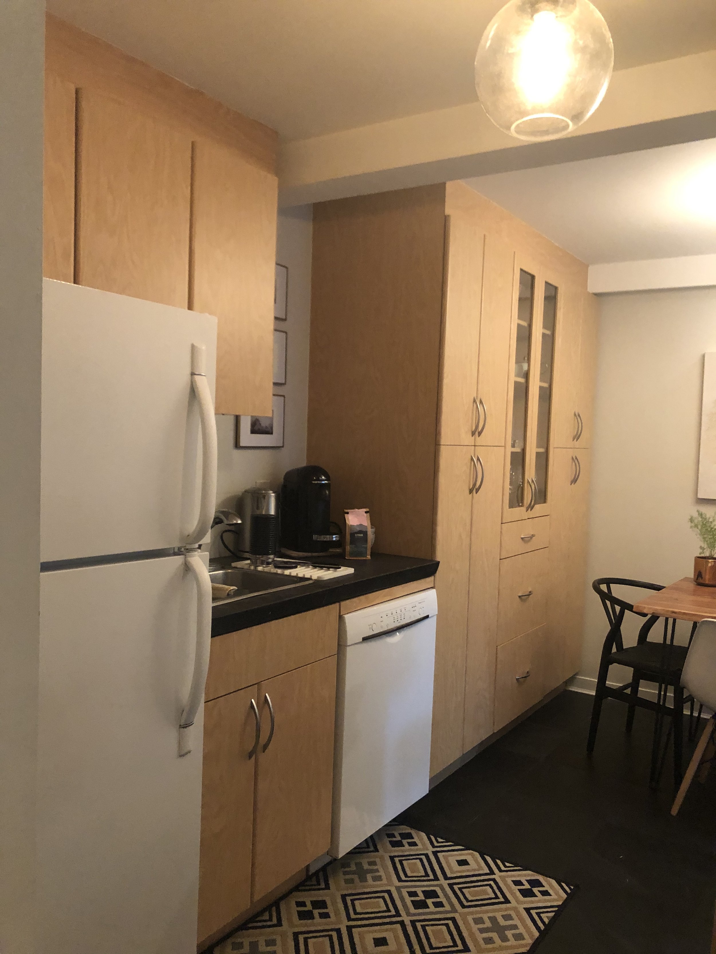 A one-bedroom condo kitchen renovation in Vancouver, BC, transformed the space with brighter finishes, modern updates, and an integrated home workstation. The redesign maximizes light and functionality, creating a fresh, efficient hub for urban livin