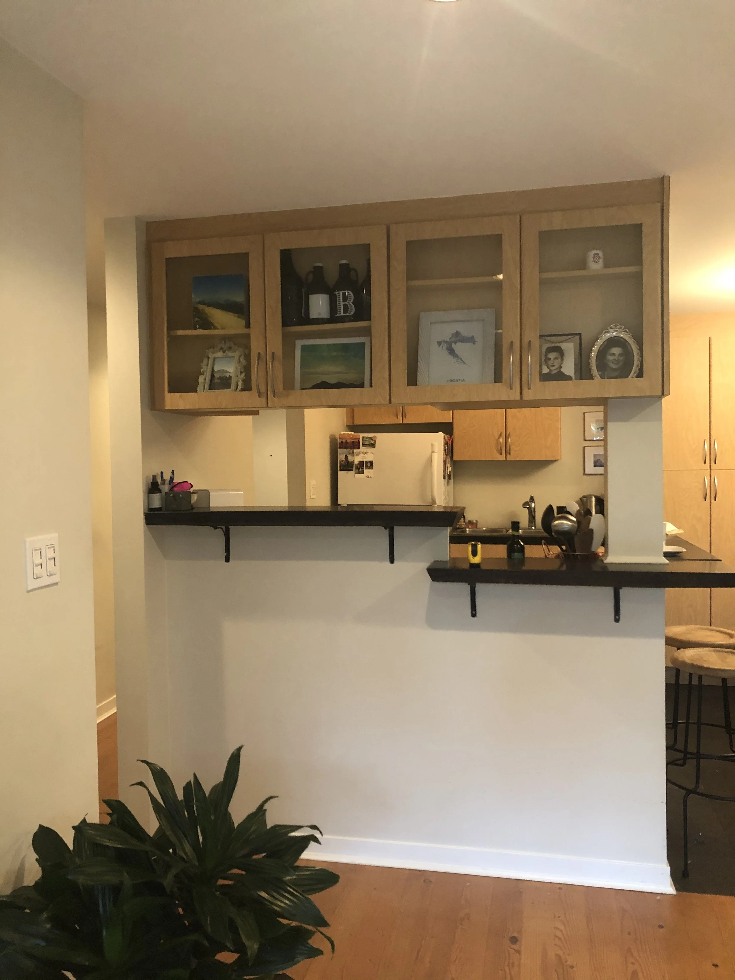 A one-bedroom condo kitchen renovation in Vancouver, BC, transformed the space with brighter finishes, modern updates, and an integrated home workstation. The redesign maximizes light and functionality, creating a fresh, efficient hub for urban livin