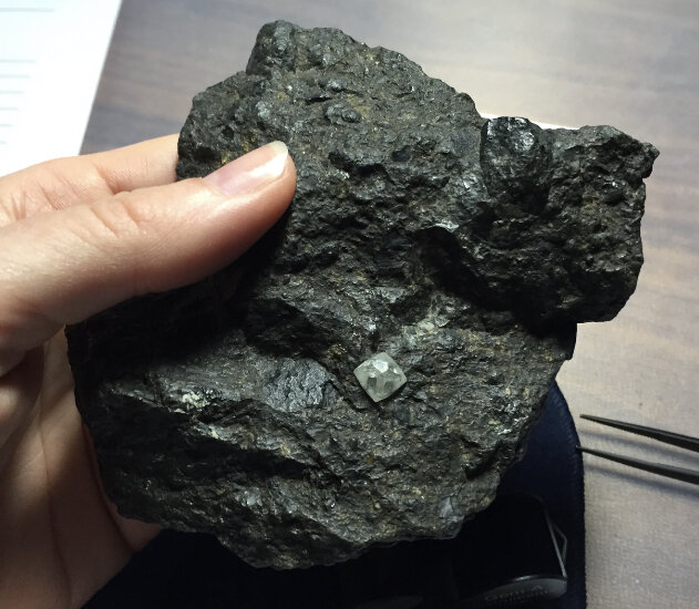 Perfect diamond octahedron trapped in chunk of loose kimberlite.  Hand specimen collection of Gem-a.