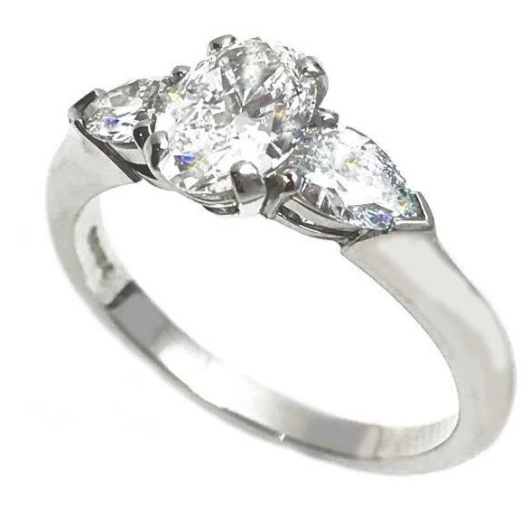 Bespoke oval and pear shape diamond engagement ring