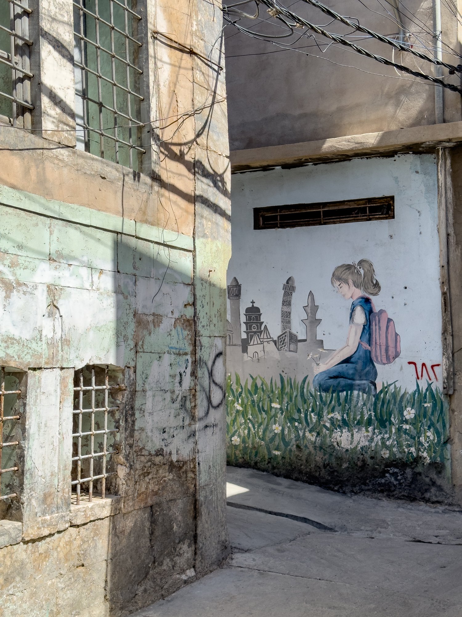 Uplifting murals have appeared amongst the ruins in Old Mosul.