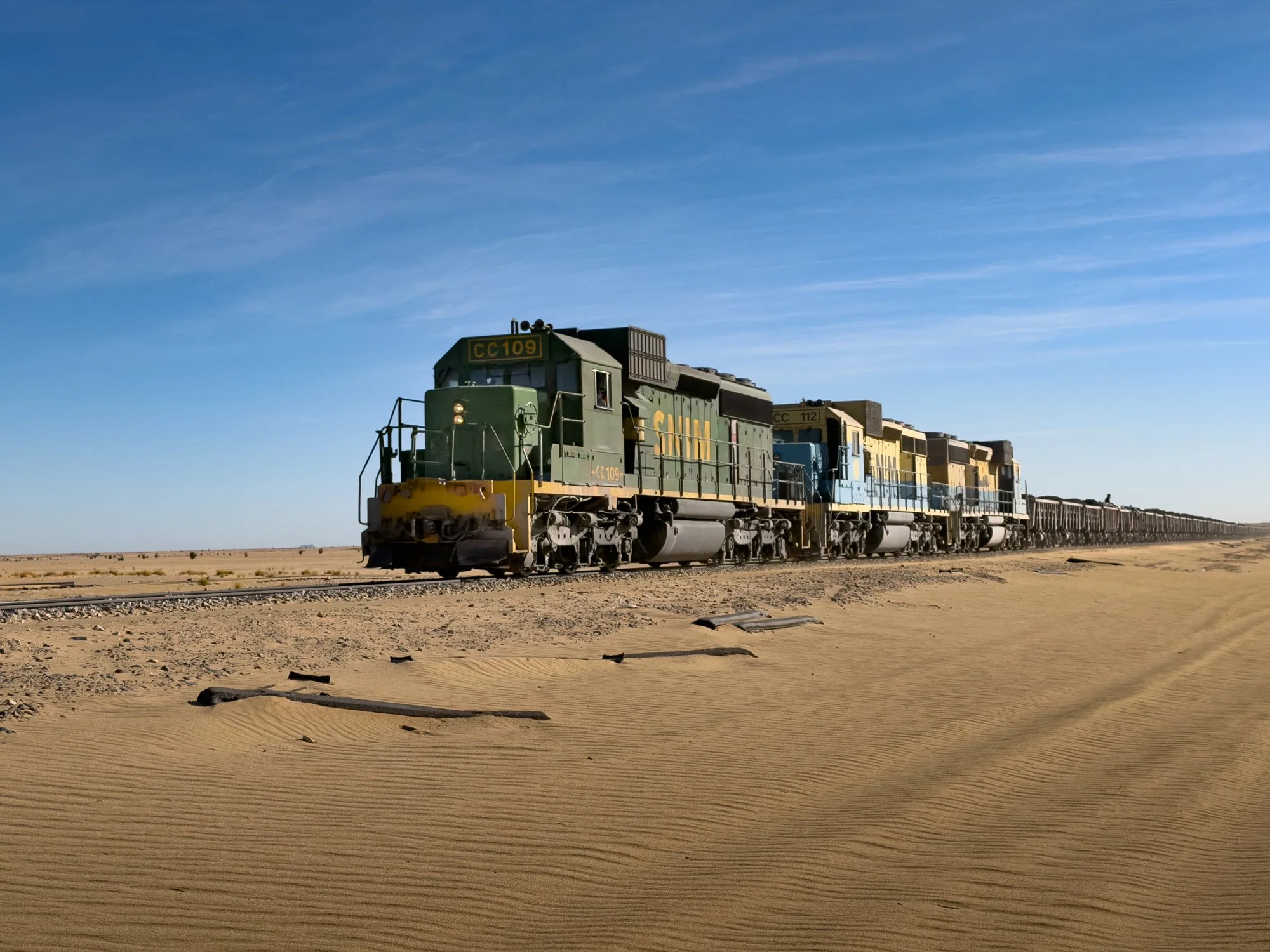 The Mauritania Iron Ore Train known as the Sahara Snake.  2.5–3 km long, among the world's longest and heaviest.
