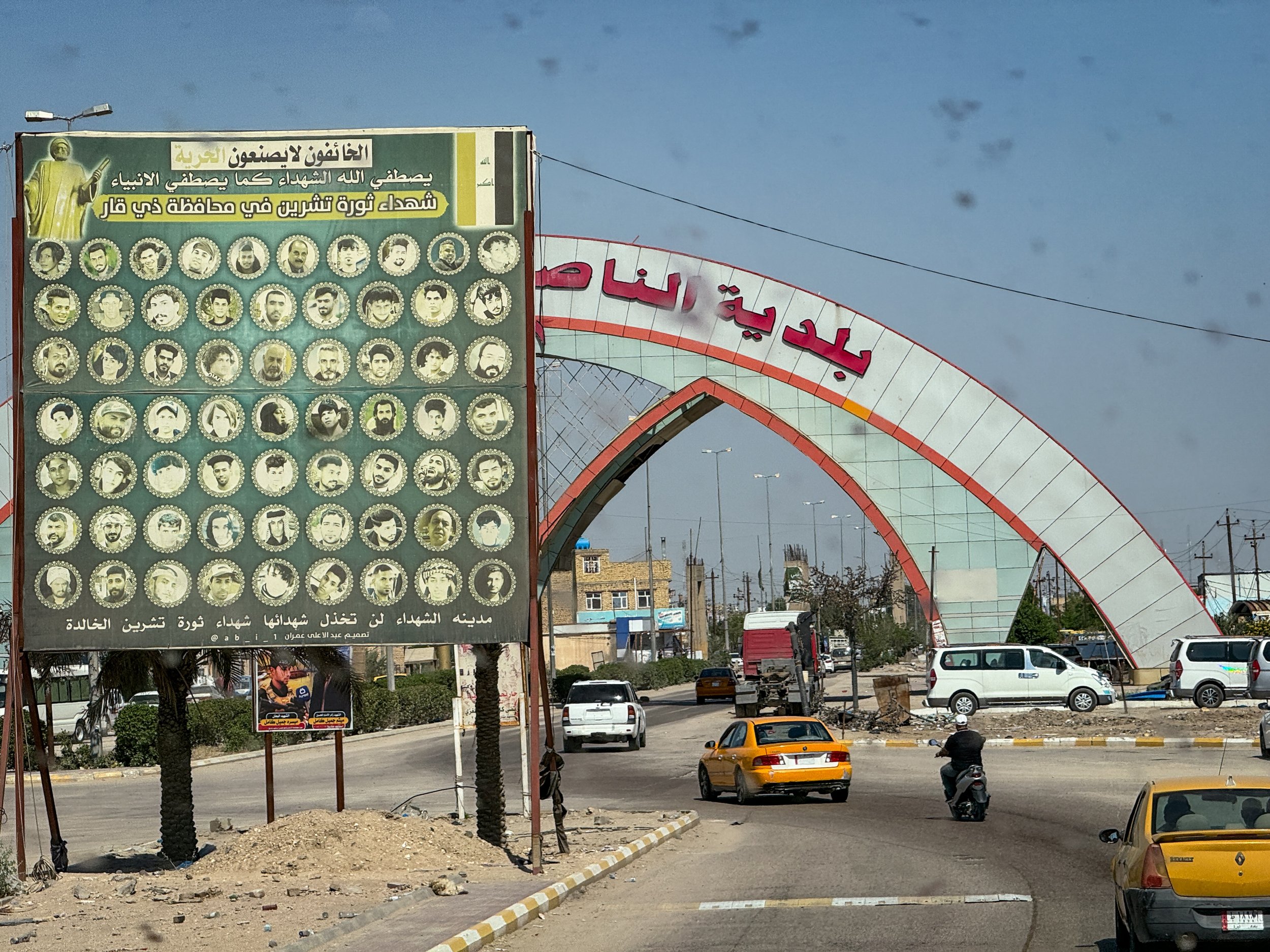 Images of the Martyrs from the last 40 years of wars in Iraq line all the Roads. This board was photographed through the insect spattered and cracked windscreen of our bus.