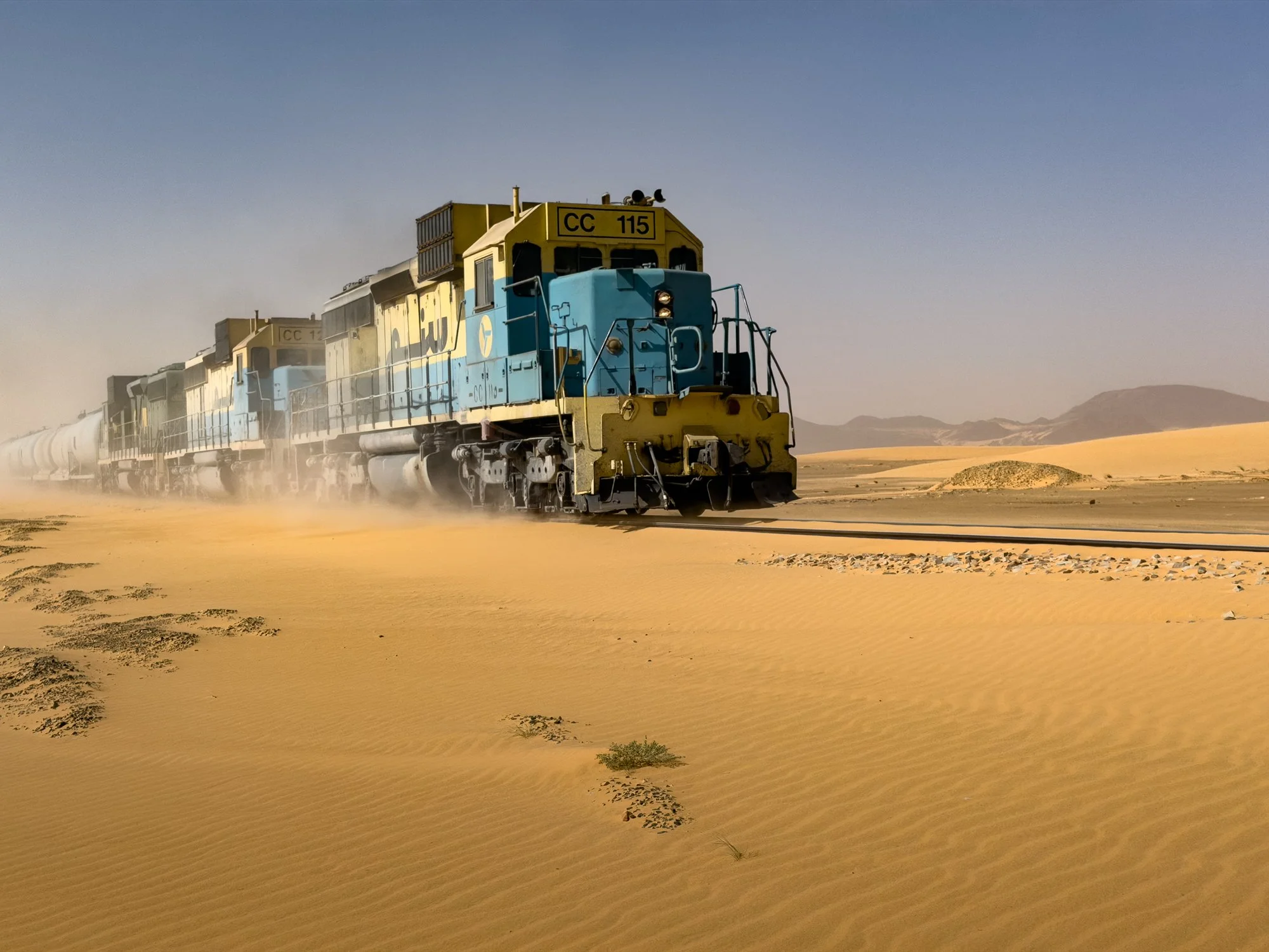 The Mauritania Iron Ore Train known as the Sahara Snake.  2.5–3 km long, among the world's longest and heaviest.