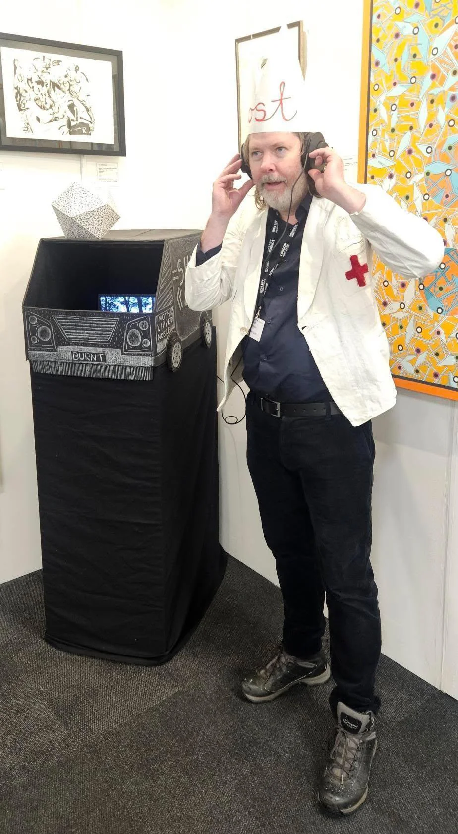 Dressing up with the van. Courtesy of Siger Gallery opposite.