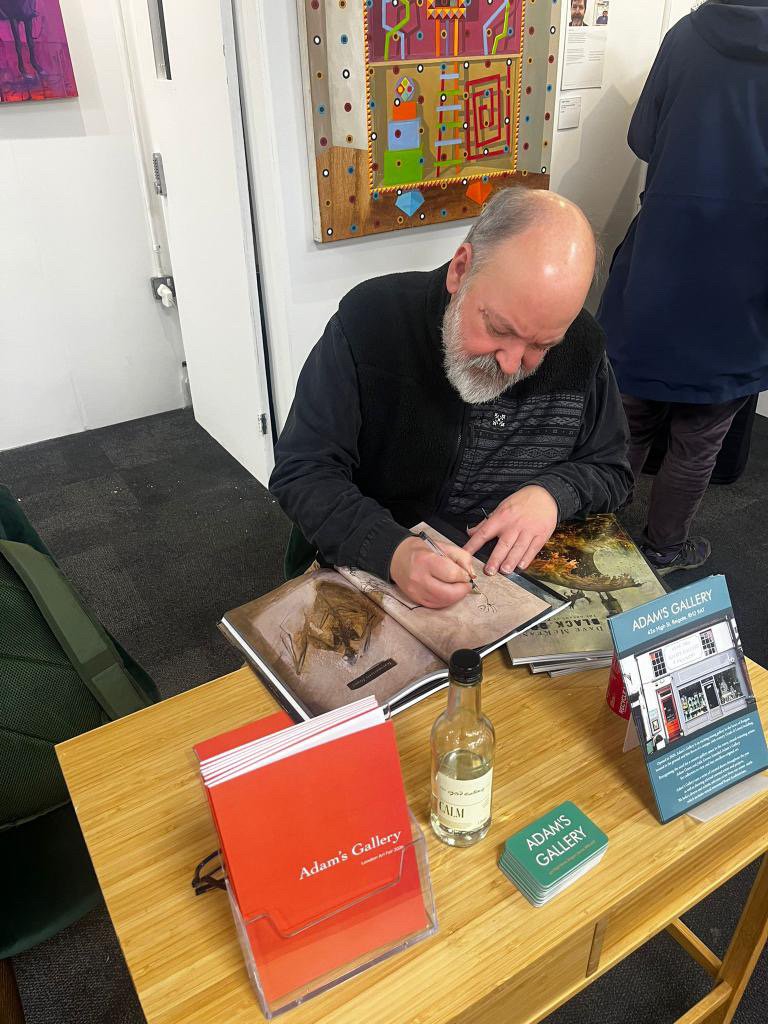 Dave McKean visiting the fair and signing books