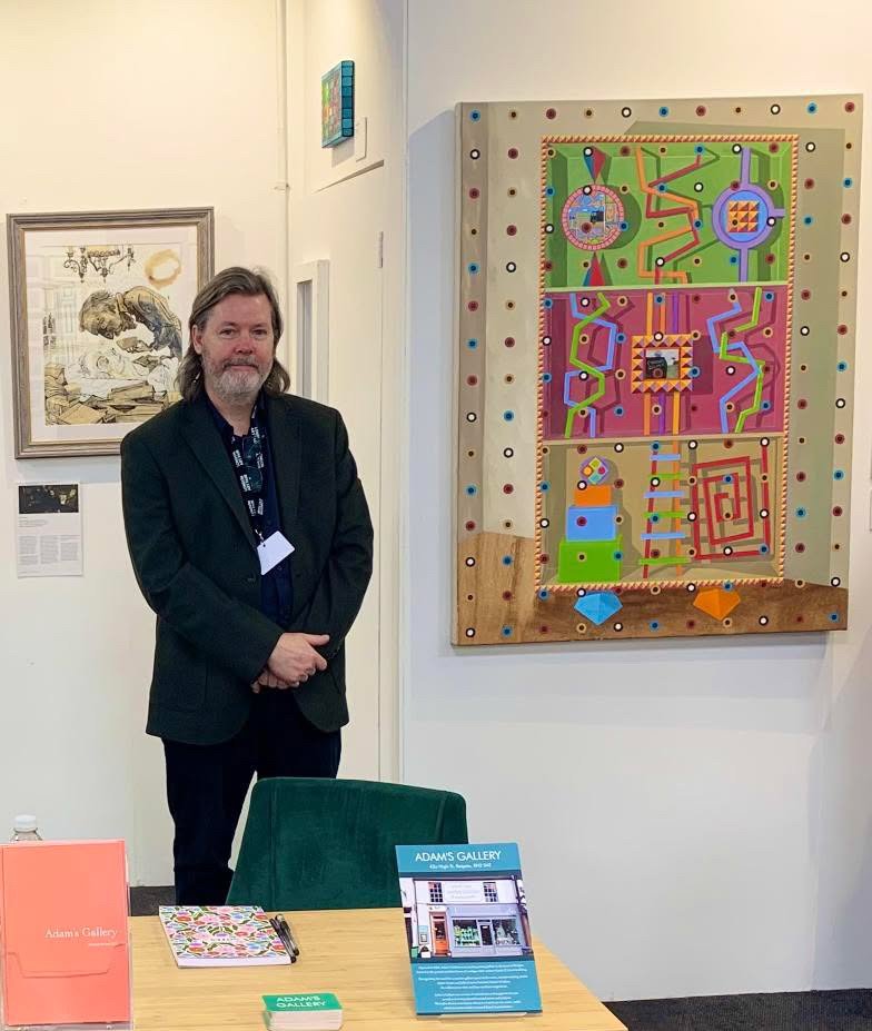 Adam Green with his painting