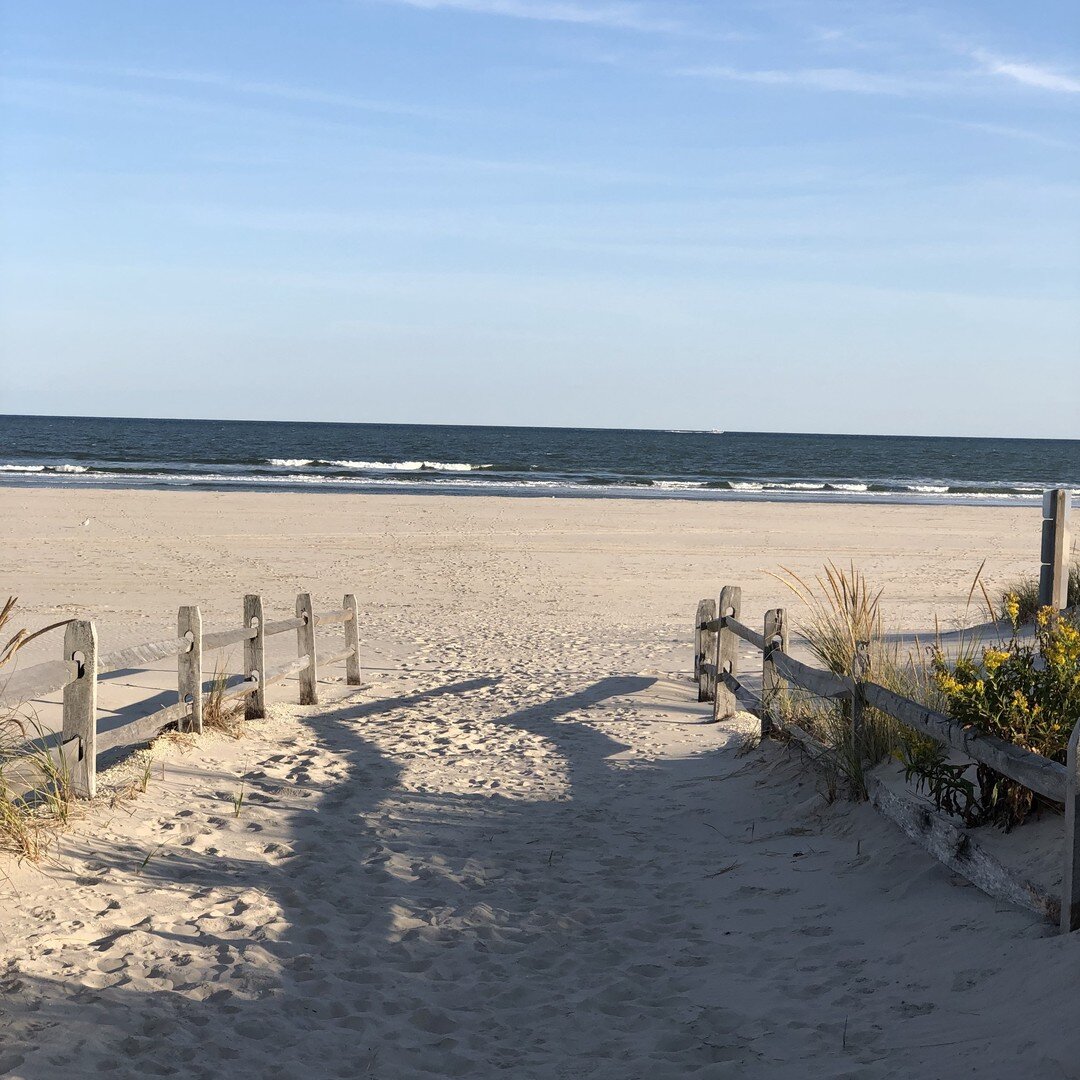 Autumn in Avalon. 

The sun makes its daily trajectory lower in the sky. The shadows spread across the dunes in the mid-afternoon. 

The beach is empty of tourists. 

Fishermen stand in the waves up to their knees covered from head to foot in their g