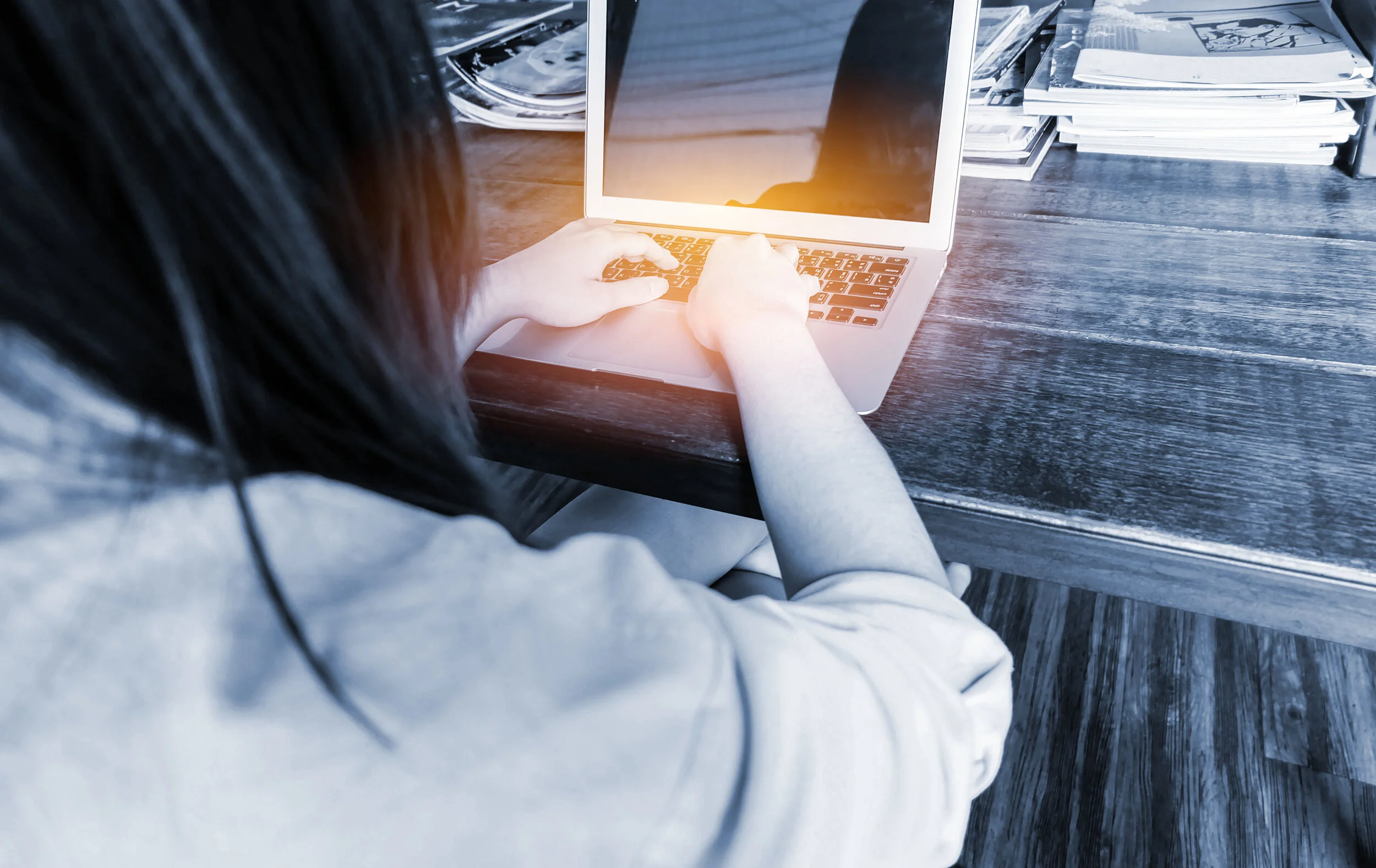 woman at laptop keyboard AdobeStock_171709185.jpeg